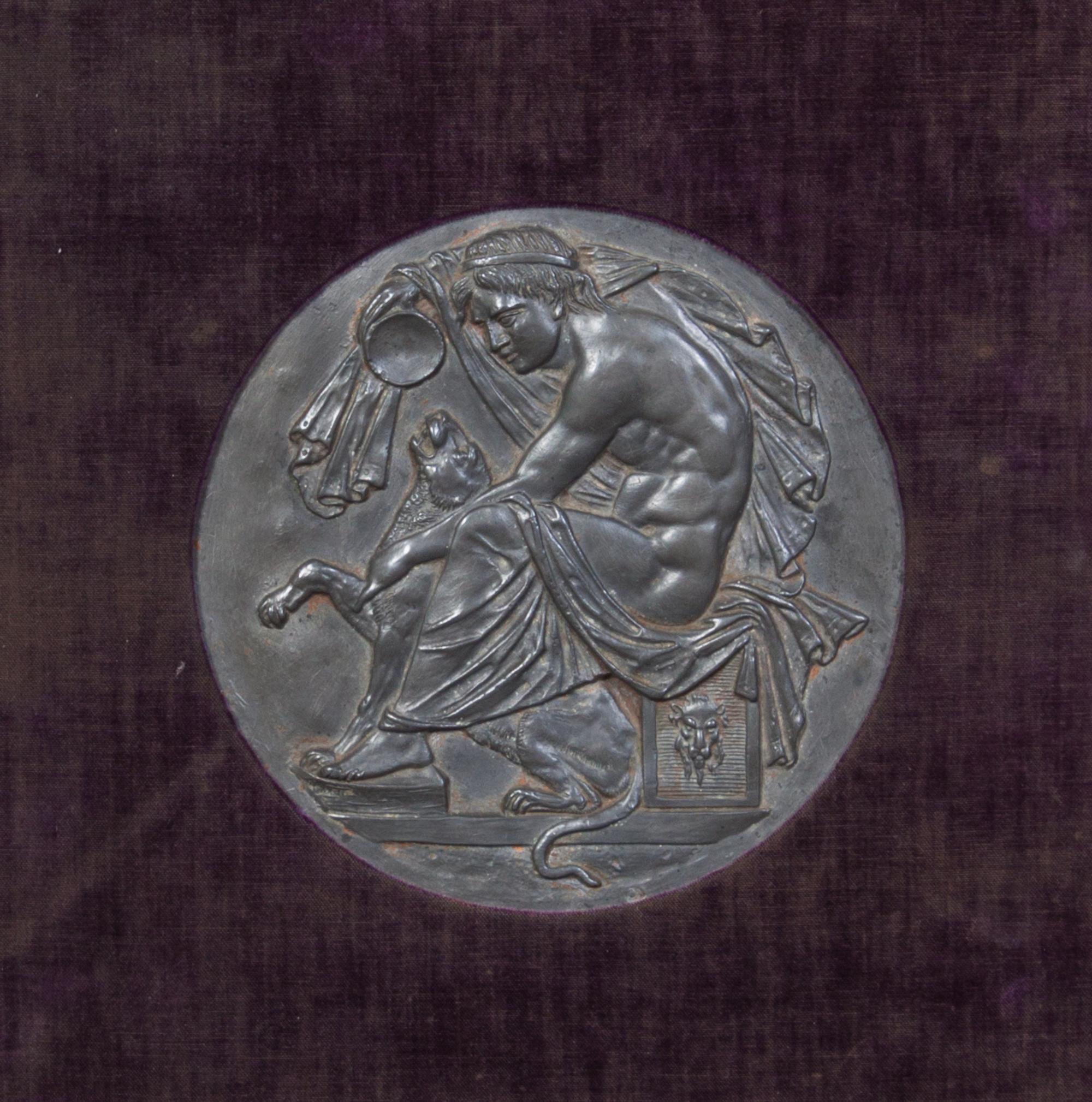 A Continental Bronze Plaque Visible diameter 6 1/2 inches.