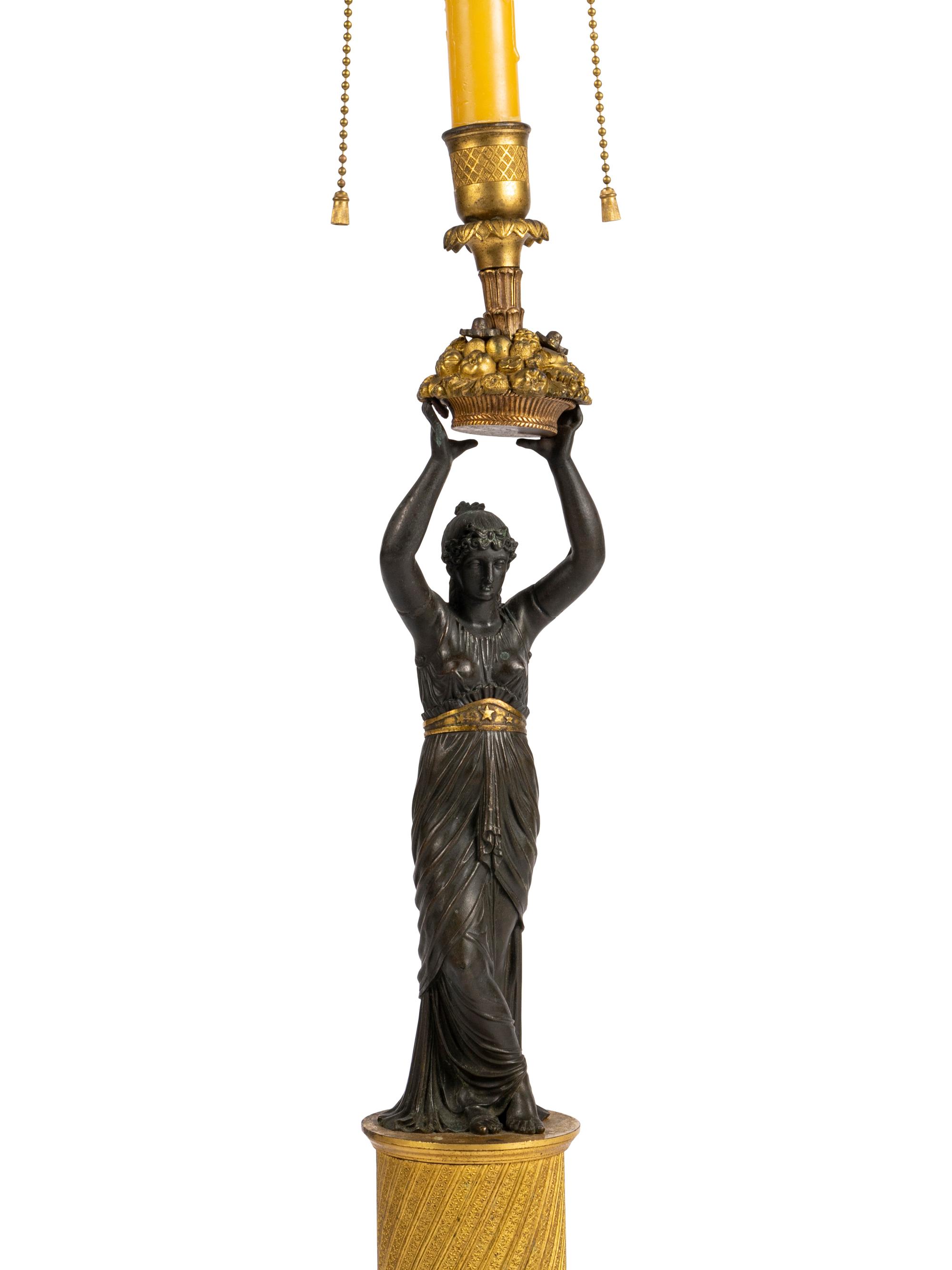 A French Gilt and Patinated Bronze Figure Mounted as a Lamp
