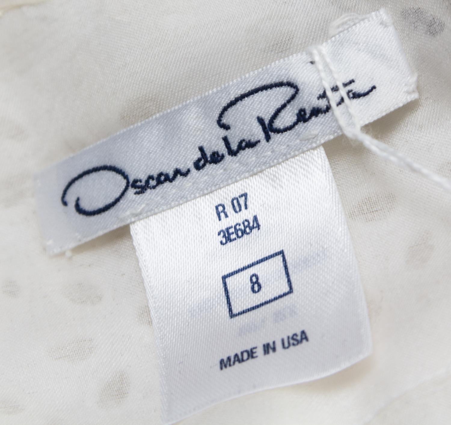 An Oscar de la Renta White Silk Embroidered Dress,