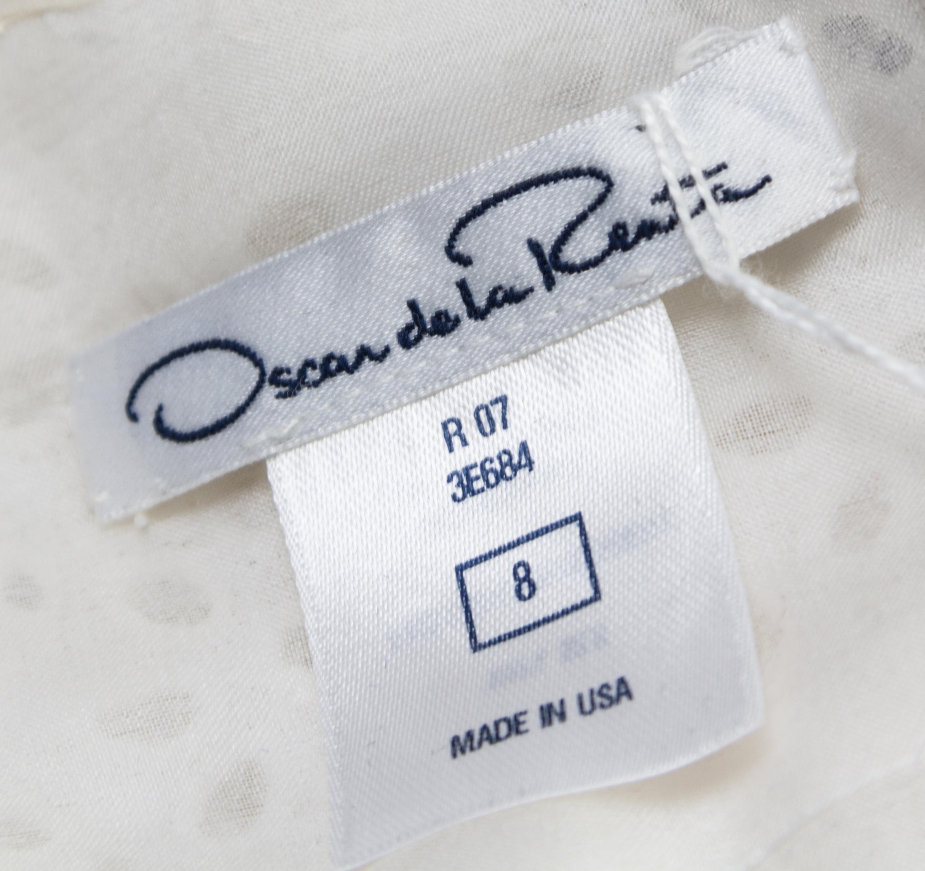 An Oscar de la Renta White Silk Embroidered Dress,