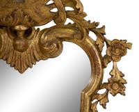 An Italian Rococo Style Giltwood Mirror