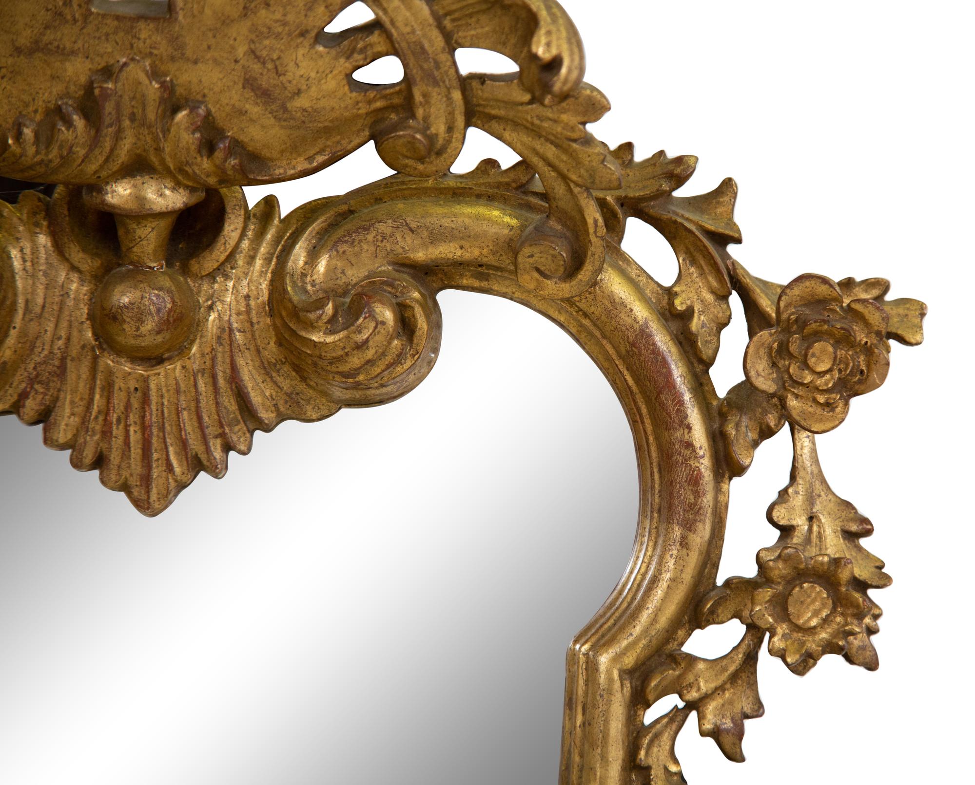 An Italian Rococo Style Giltwood Mirror