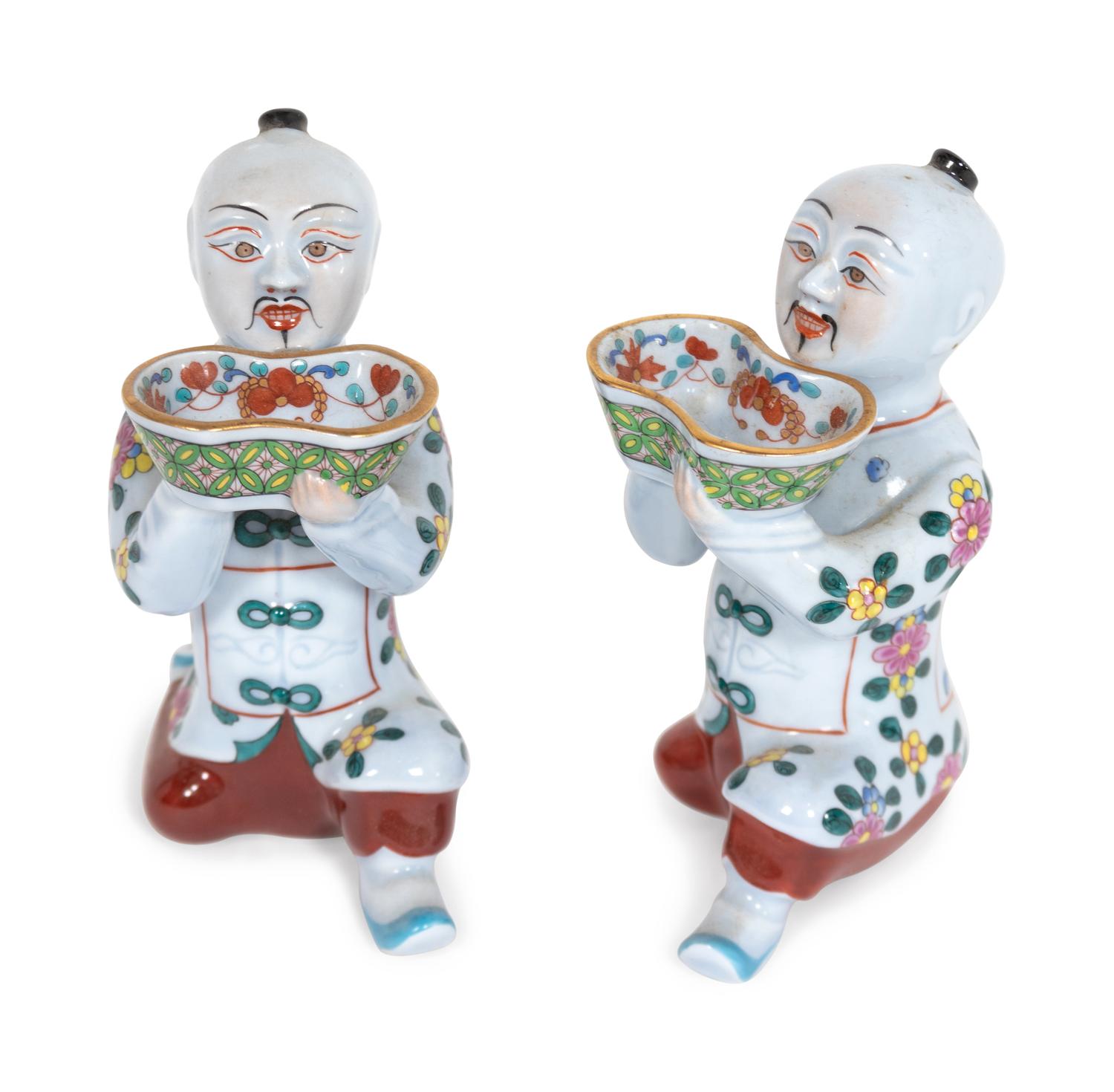 A Pair of Herend Porcelain Figures of Chinese Kneeling Waiters