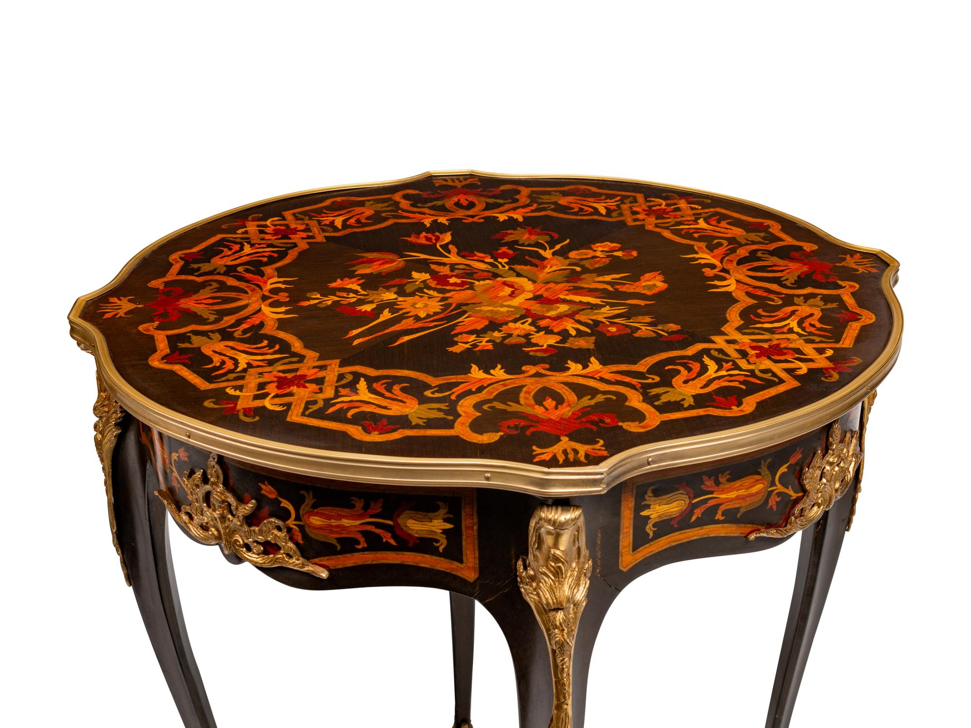 A Pair of Louis XV Style Gilt-Bronze-Mounted Marquetry Tables de Milieu