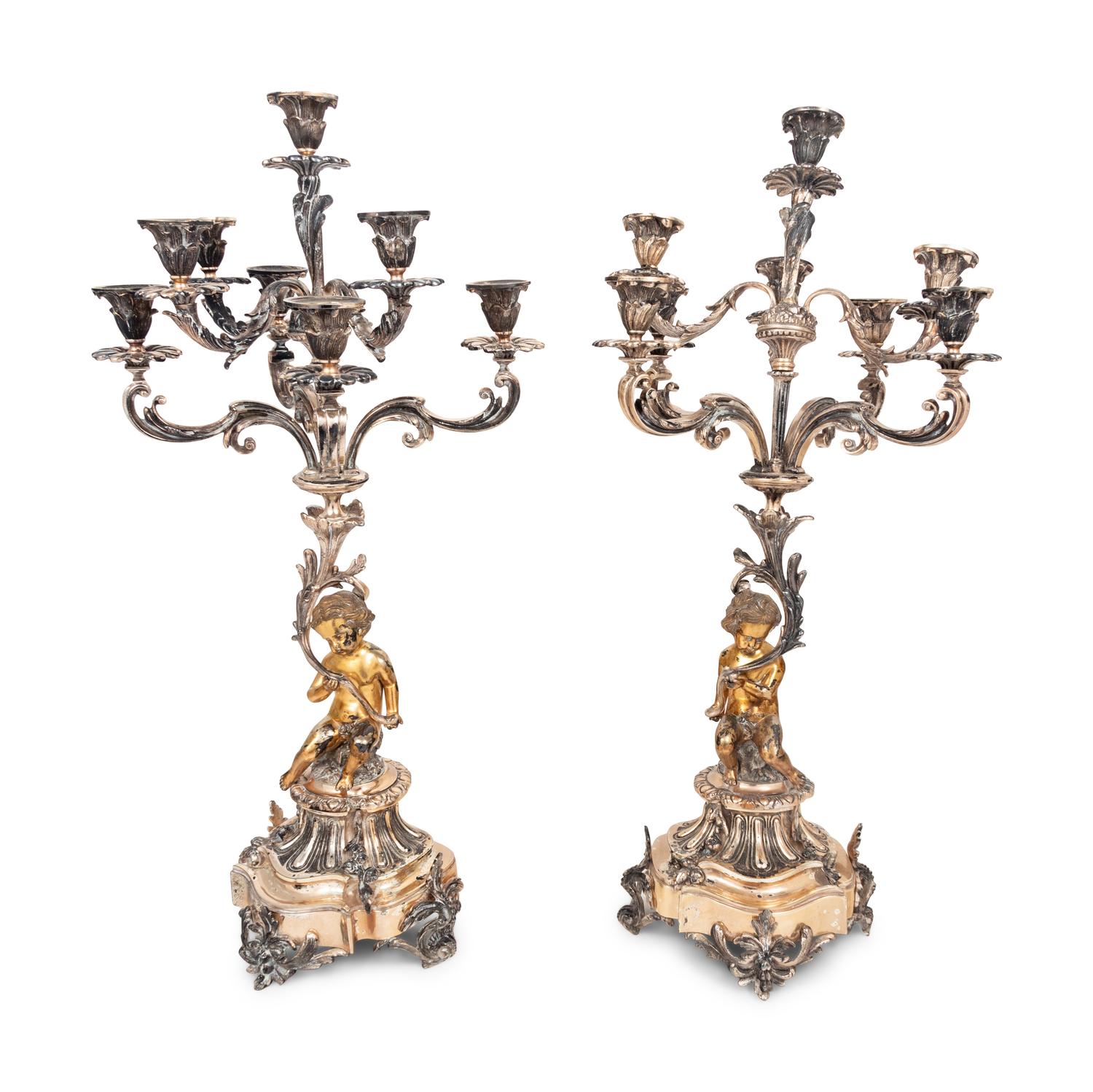 A Pair of Silver-Plate Figural Eight-Light Candelabra