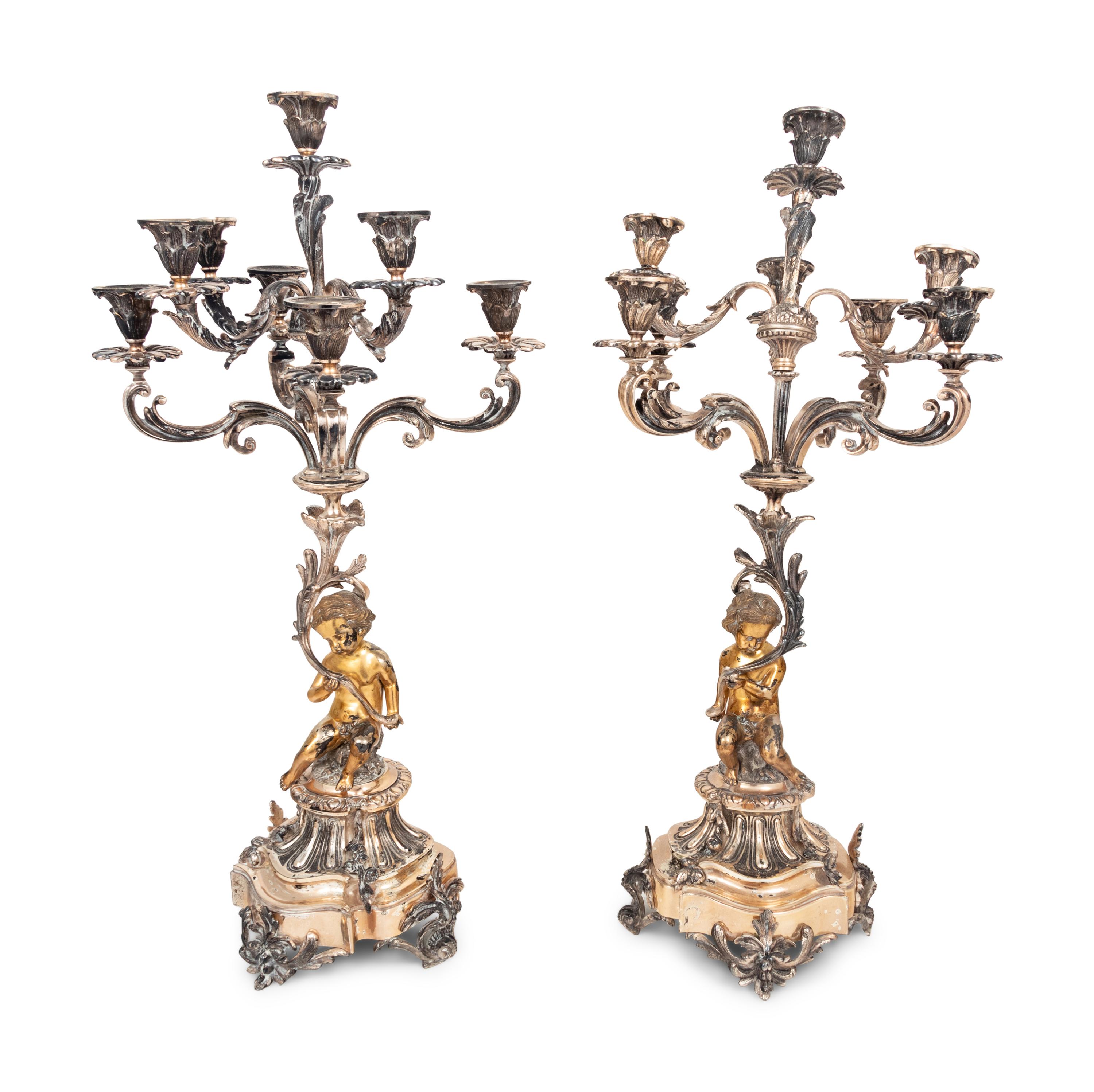 A Pair of Silver-Plate Figural Eight-Light Candelabra