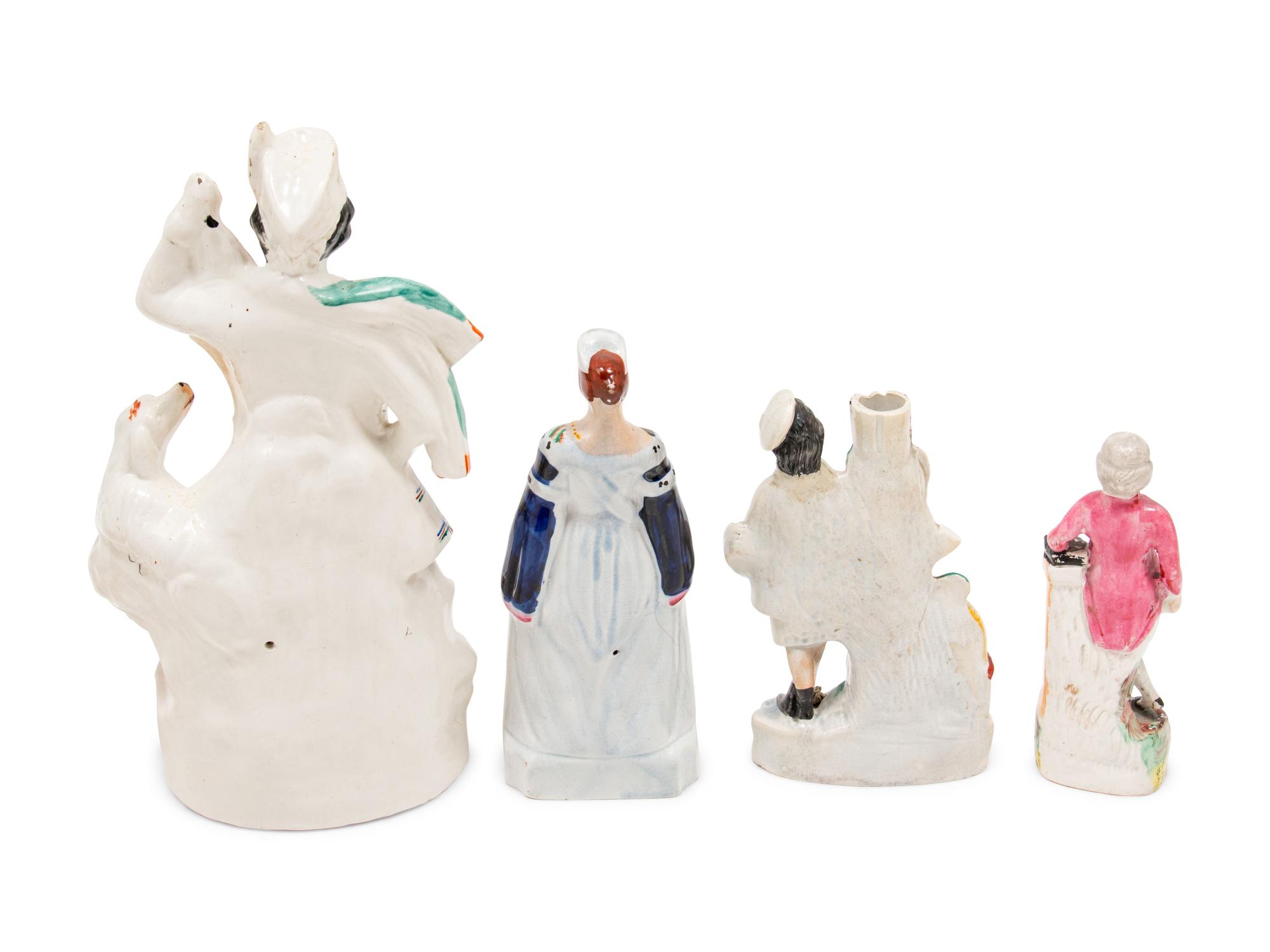 A Group of Eight Staffordshire Figures