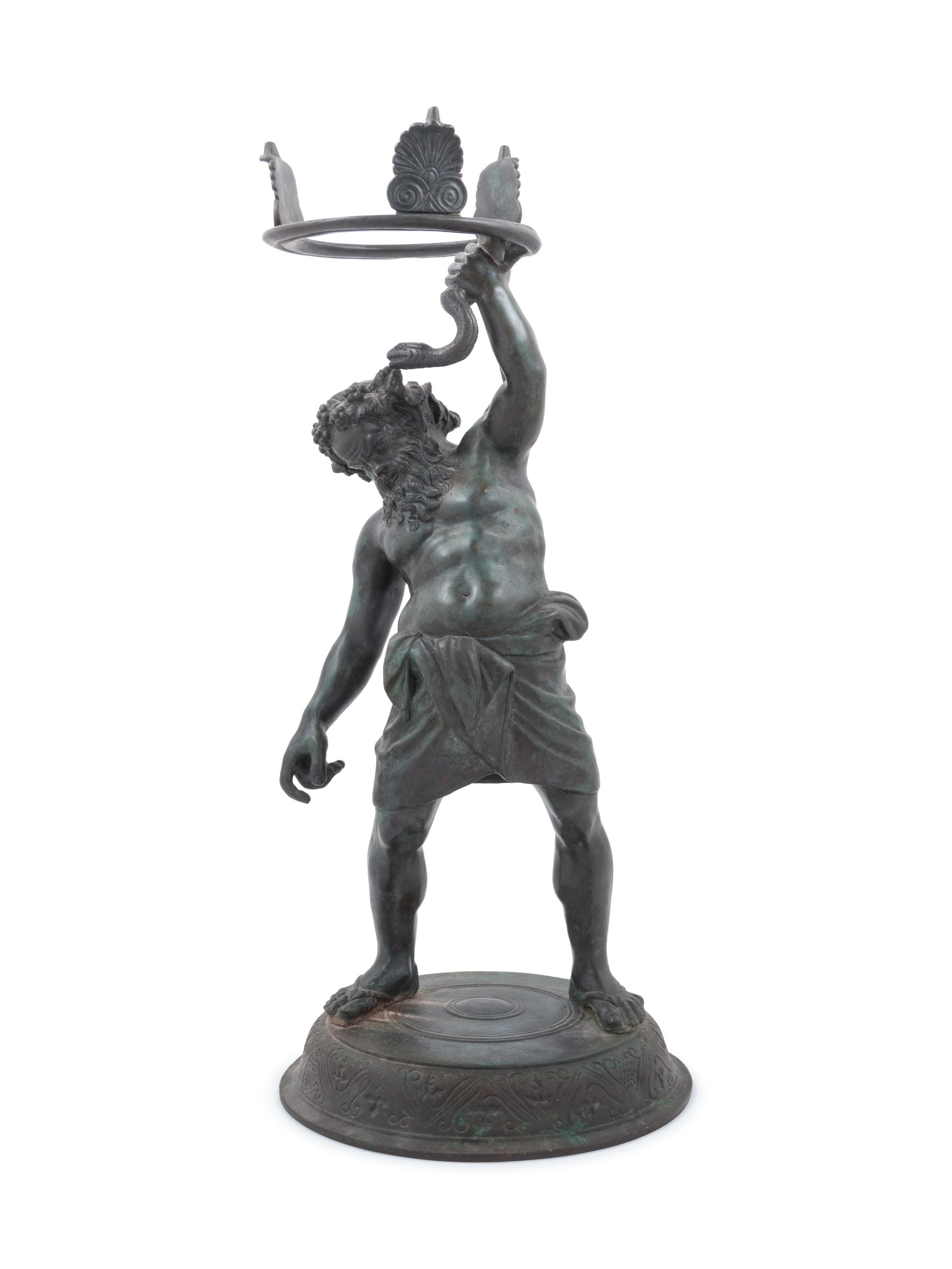 A Grand Tour Patinated Metal Figure of Silenus