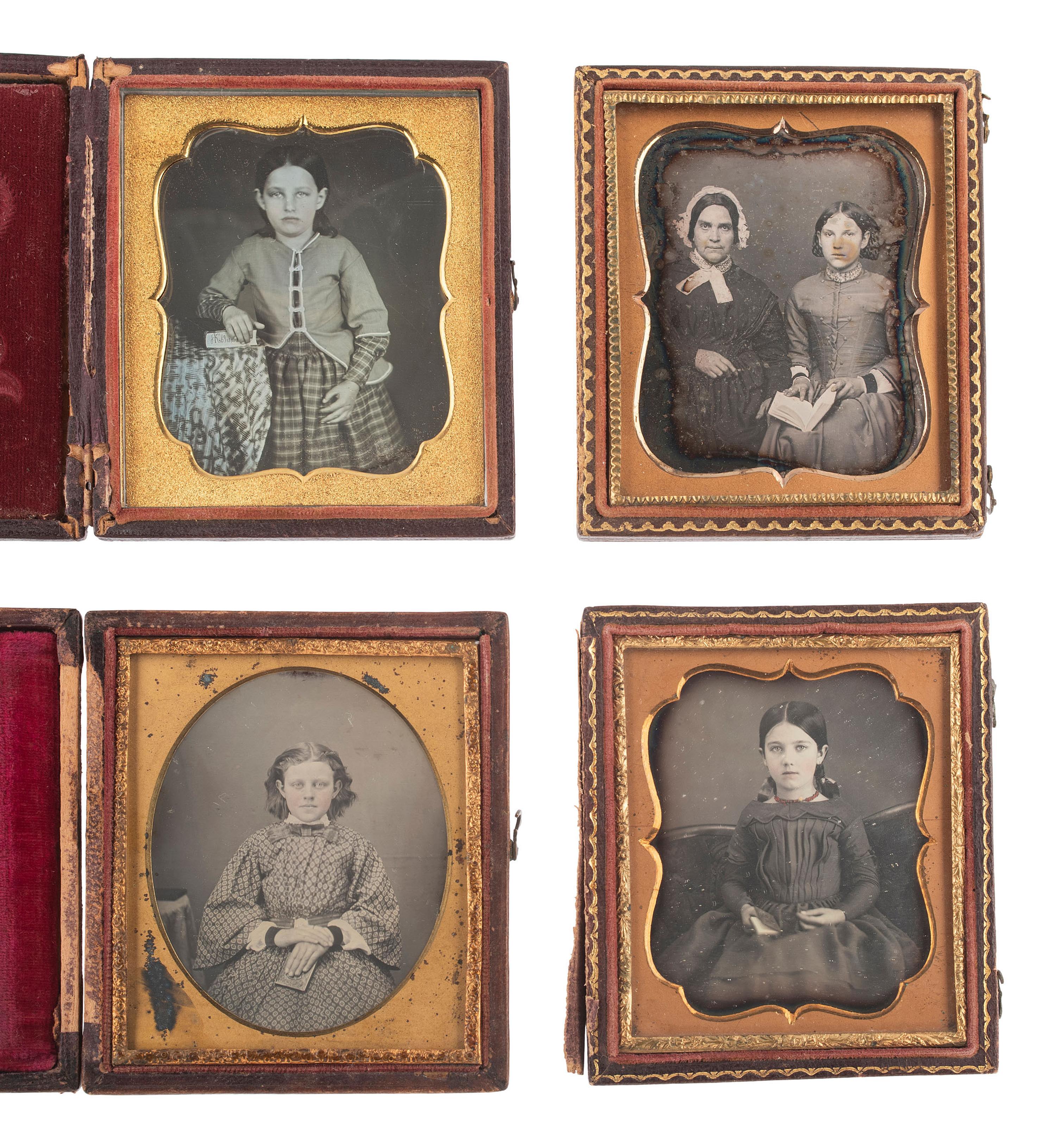 [EARLY PHOTOG] 16 sixth plate daguerreotypes of girls & young ladies posed with books & cased images