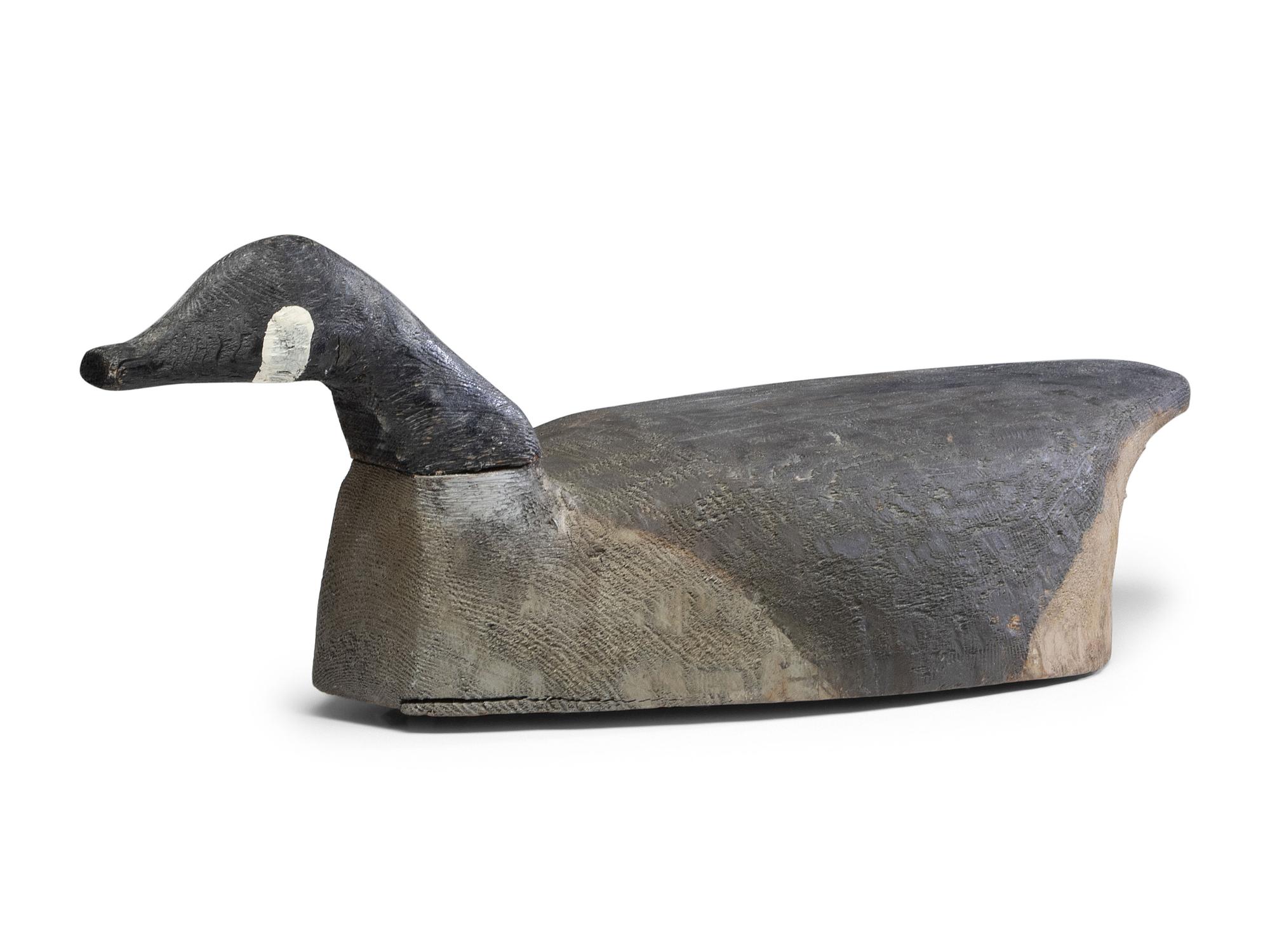 A Carved and Painted White Pine Canadian Goose Decoy