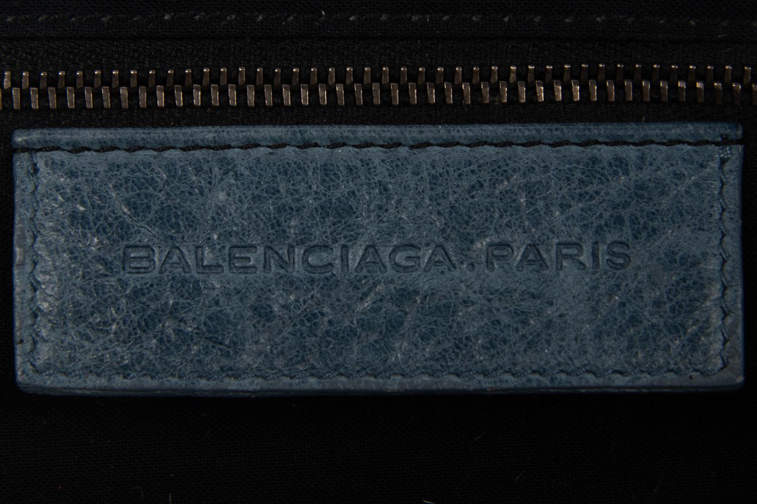 Five Prada Nylon Accessories and One Balenciaga Clutch