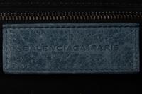 Five Prada Nylon Accessories and One Balenciaga Clutch