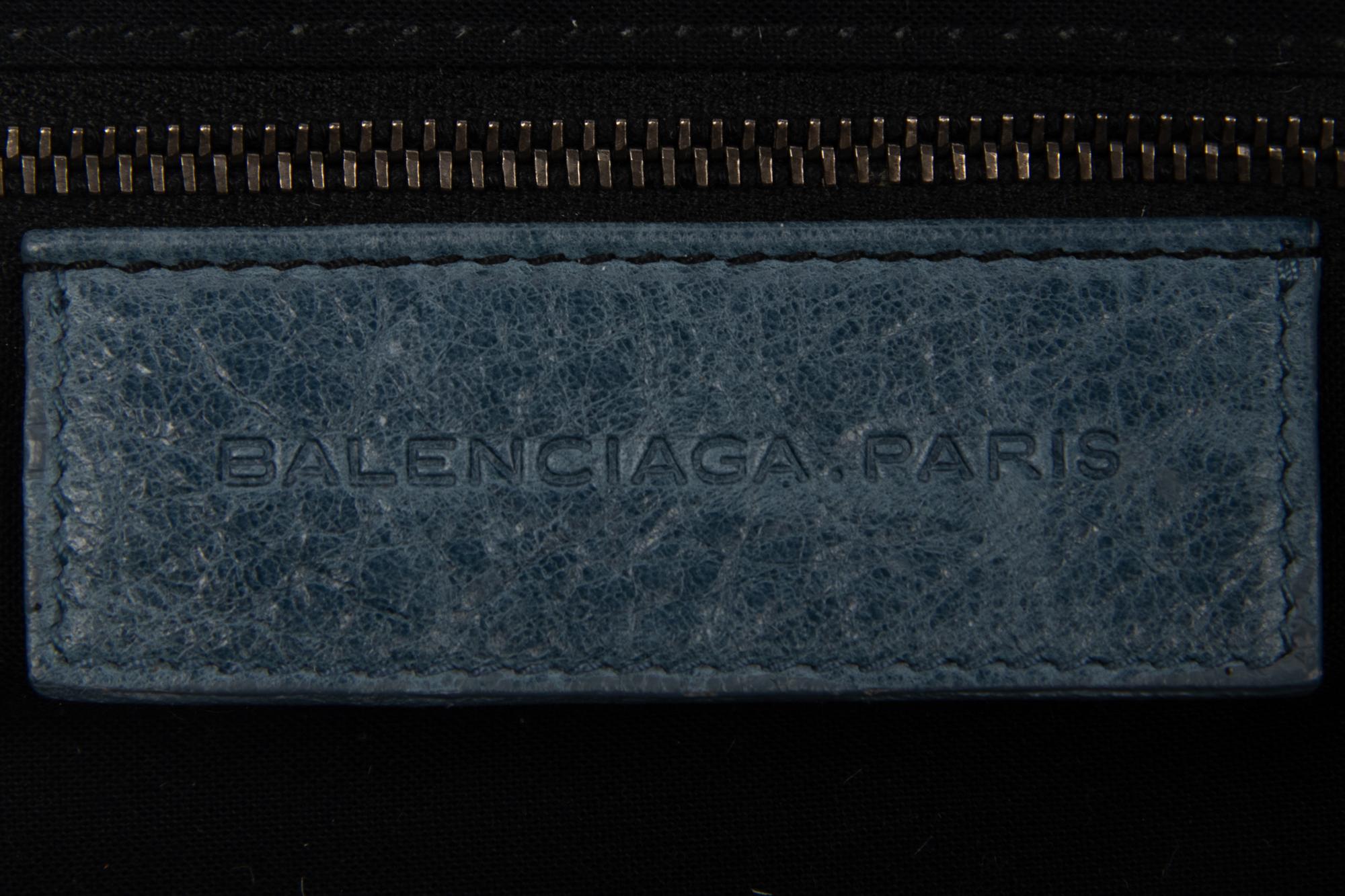 Five Prada Nylon Accessories and One Balenciaga Clutch
