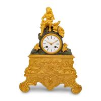 A Louis Philippe Gilt and Patinated Bronze Mantel Clock
