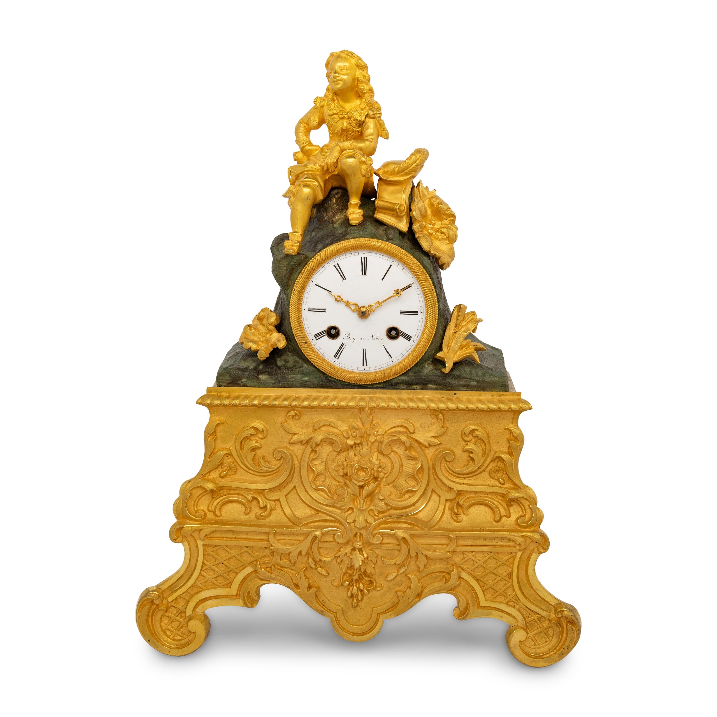 A Louis Philippe Gilt and Patinated Bronze Mantel Clock