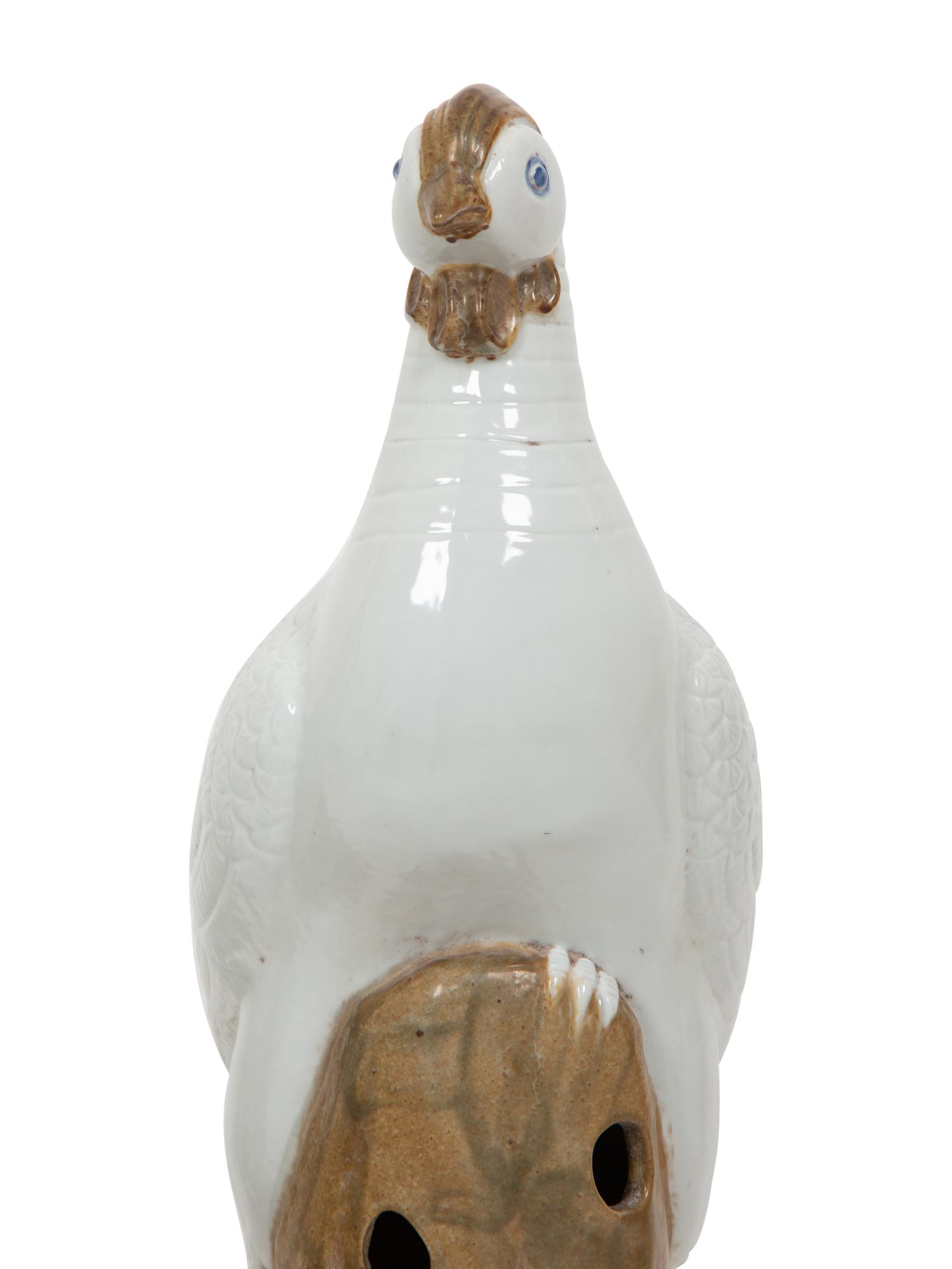 A Pair of Chinese Glazed Ceramic Exotic Birds