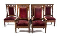 A Set of Eight Gothic Revival Oak Chairs, Height of armchairs 50 1/2 inches.