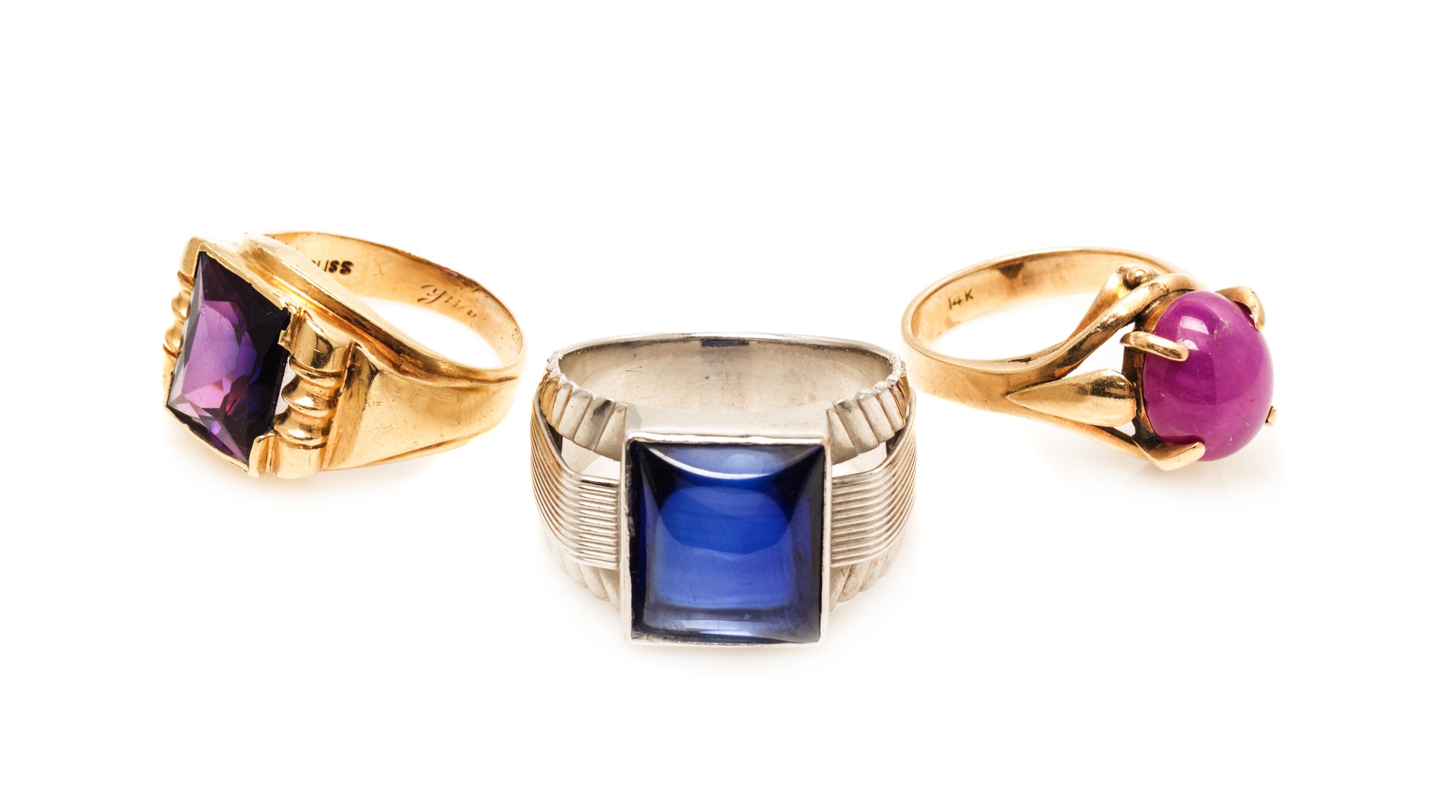 A Collection of 14 Karat Yellow Gold and Synthetic Gemstone Jewelry, 31.10 dwts.