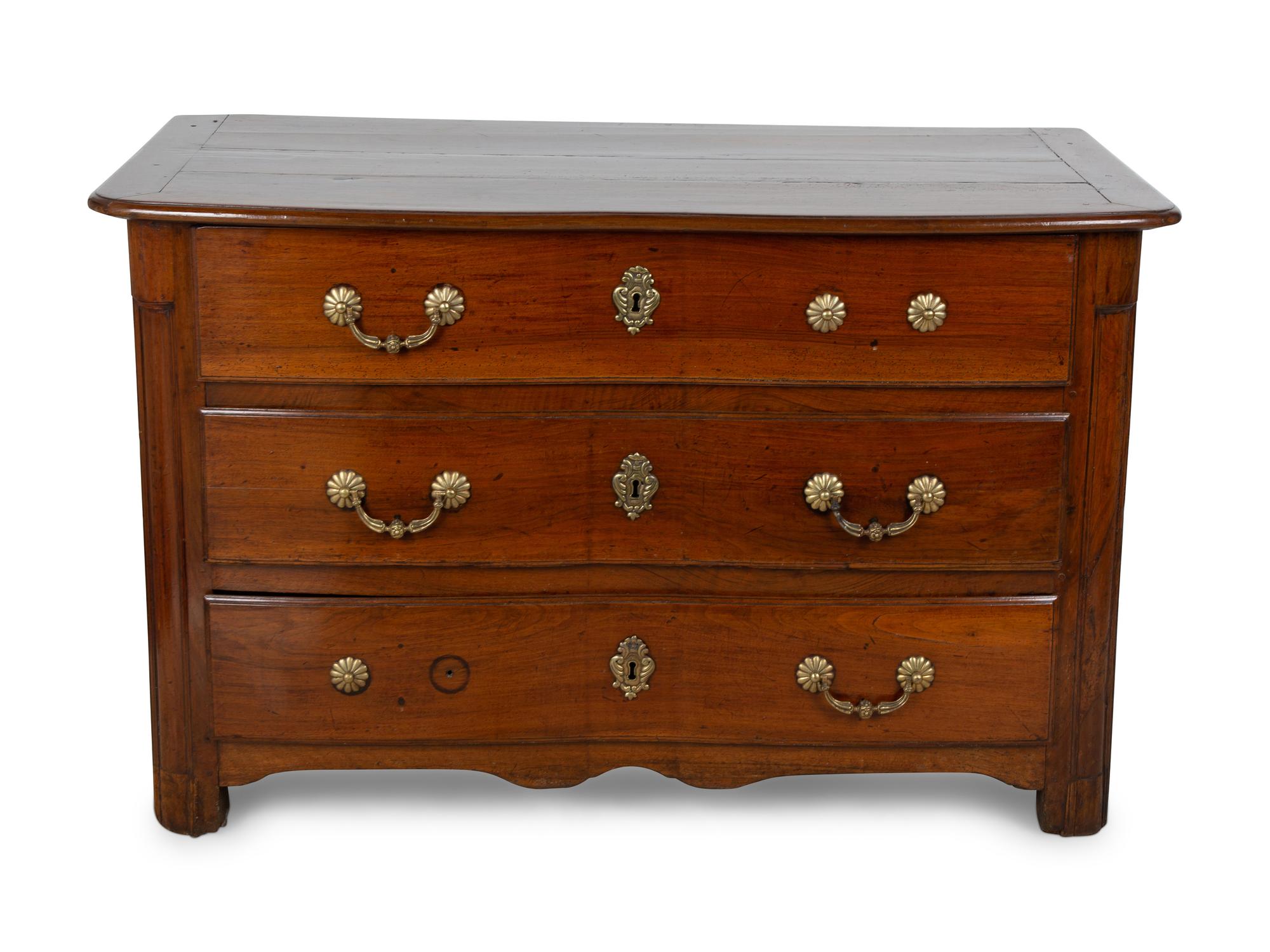 A Louis XV Style Walnut Commode