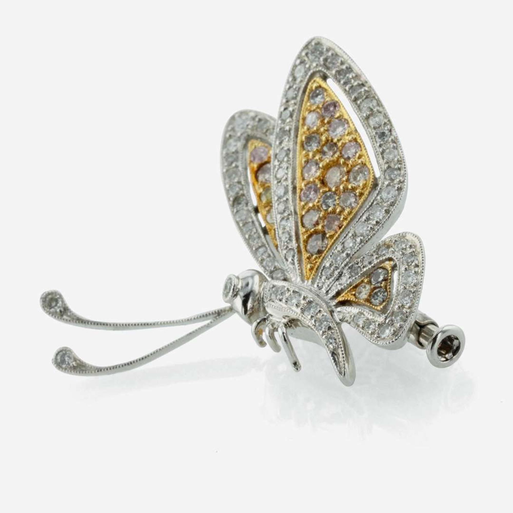 A Colored Diamond, Diamond and 18K Two-Tone Gold Brooch