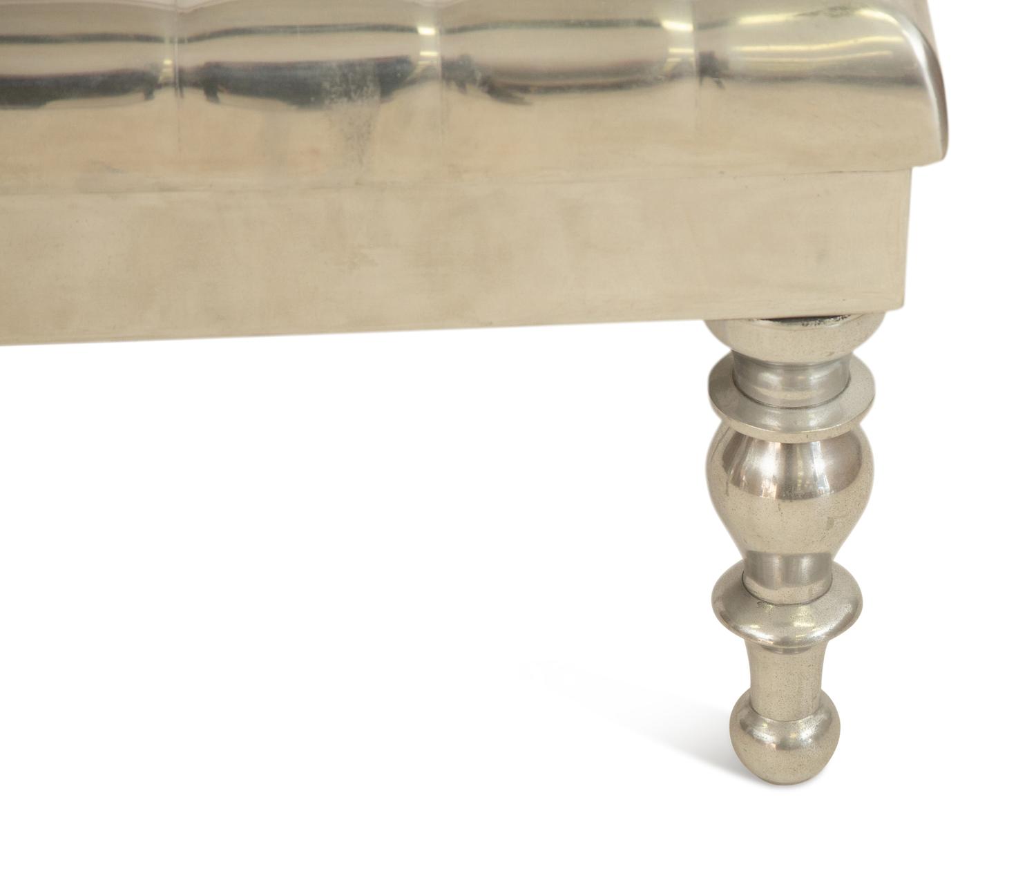 An Aluminimum Faux Button Tufted Ottoman