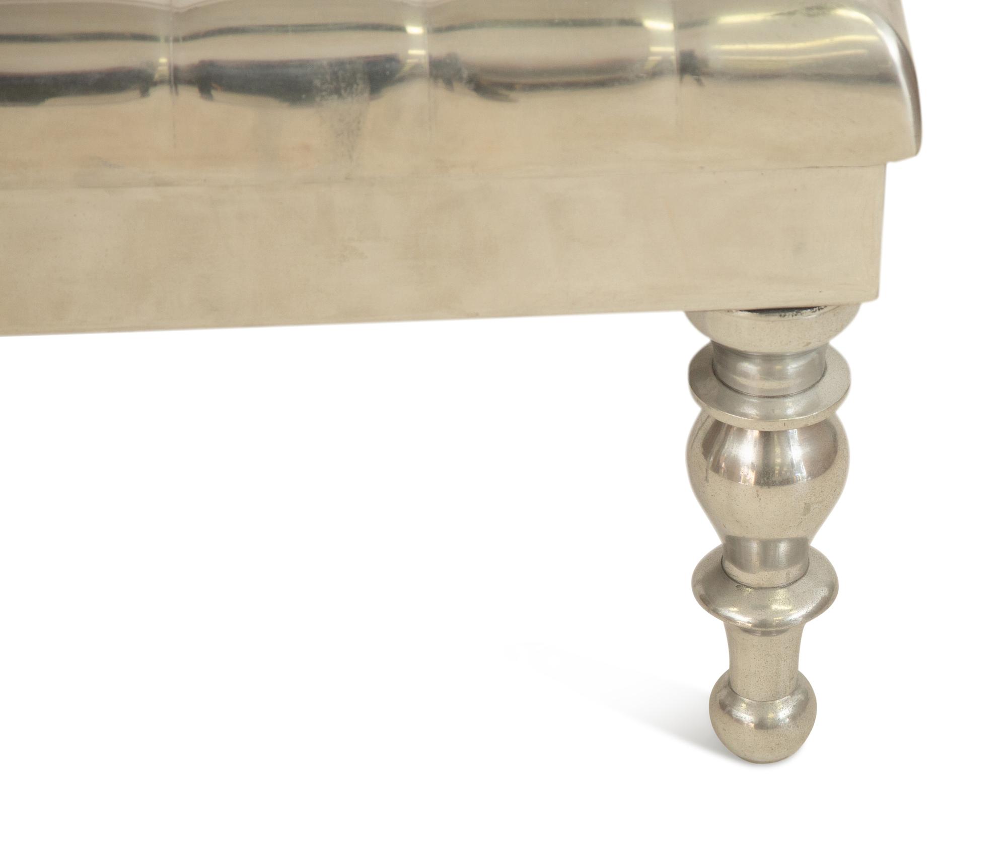 An Aluminimum Faux Button Tufted Ottoman