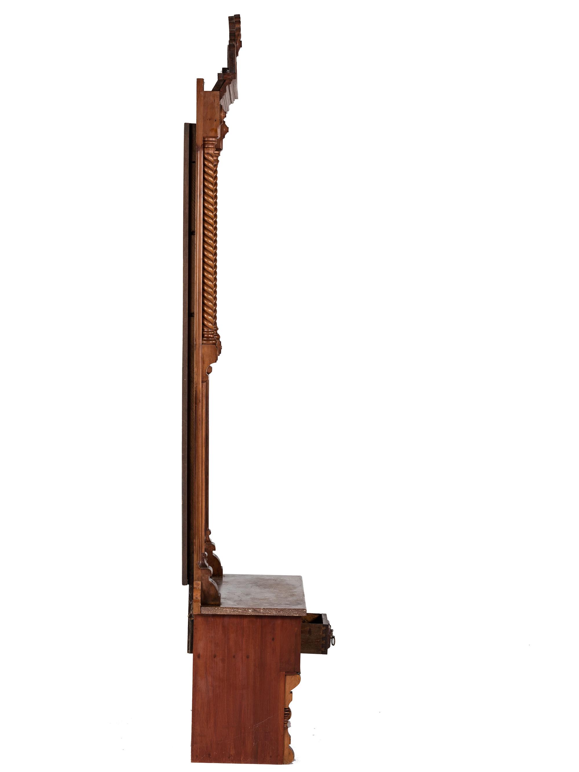 An Eastlake Style Hall Mirror with Marble Top Cabinet Base