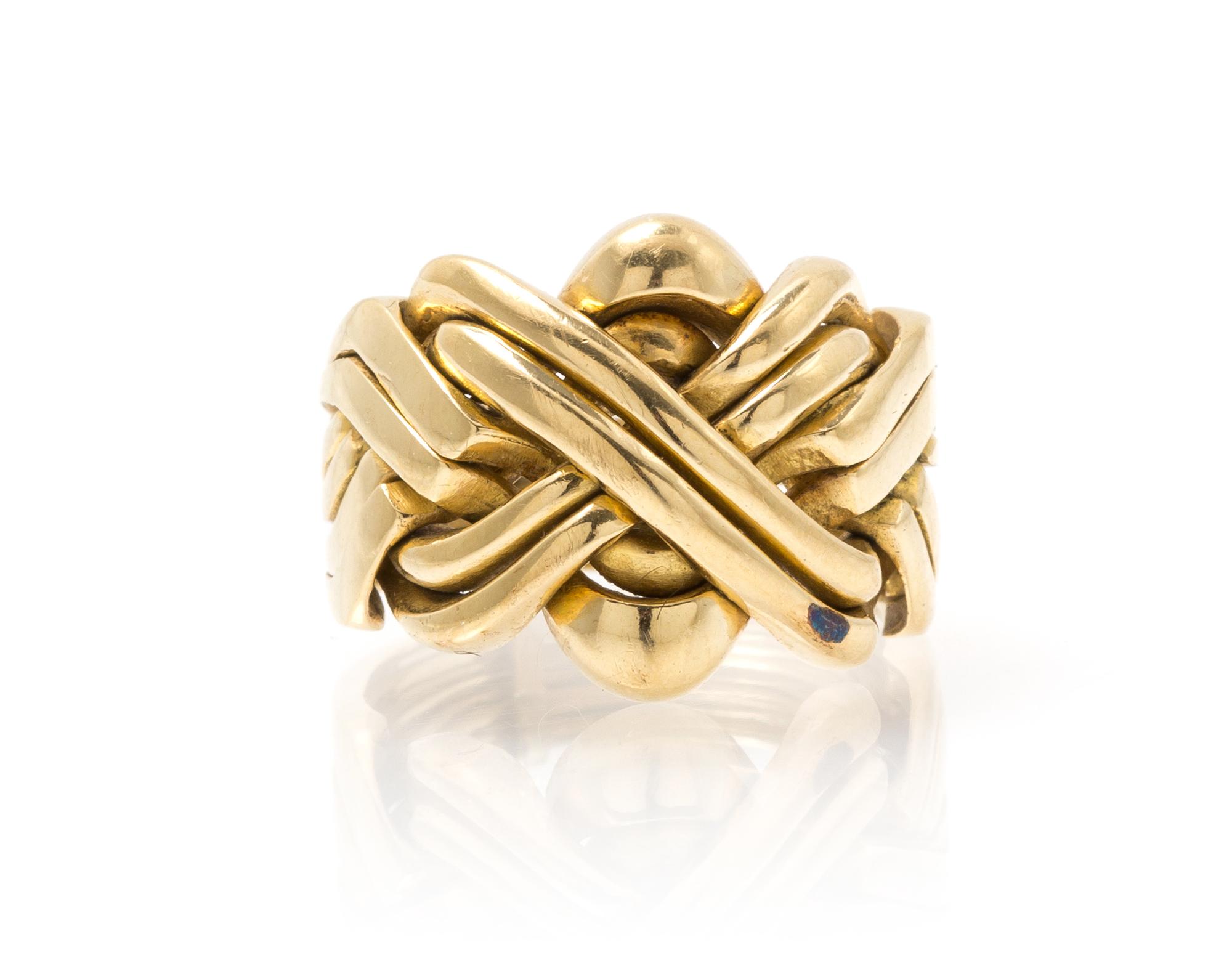 A 14 Karat Yellow Gold Puzzle Ring, 6.50 dwts.