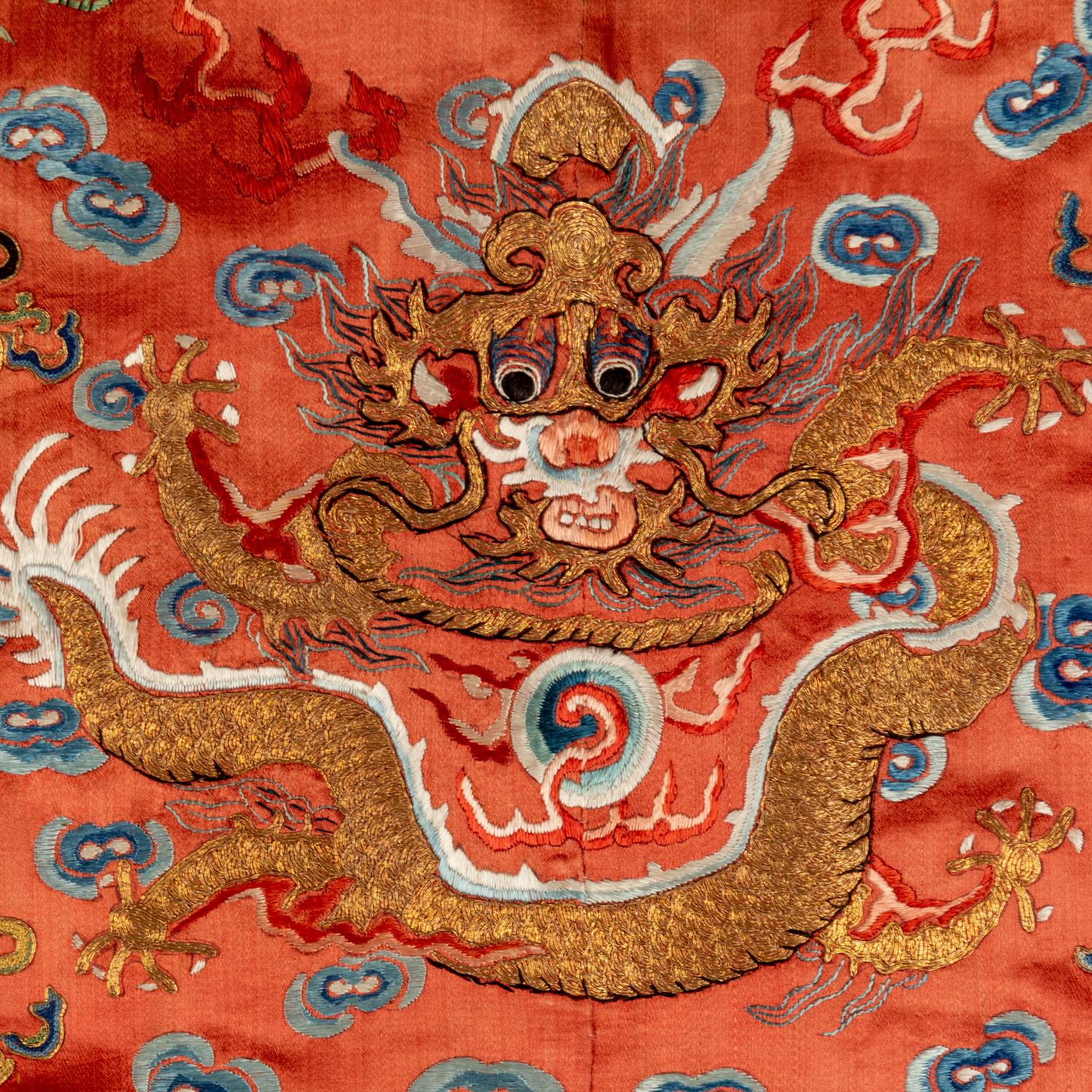 Two Chinese Red Ground Embroidered Silk Robes, 19th Century 清晚期 紅緞地袍褂兩件