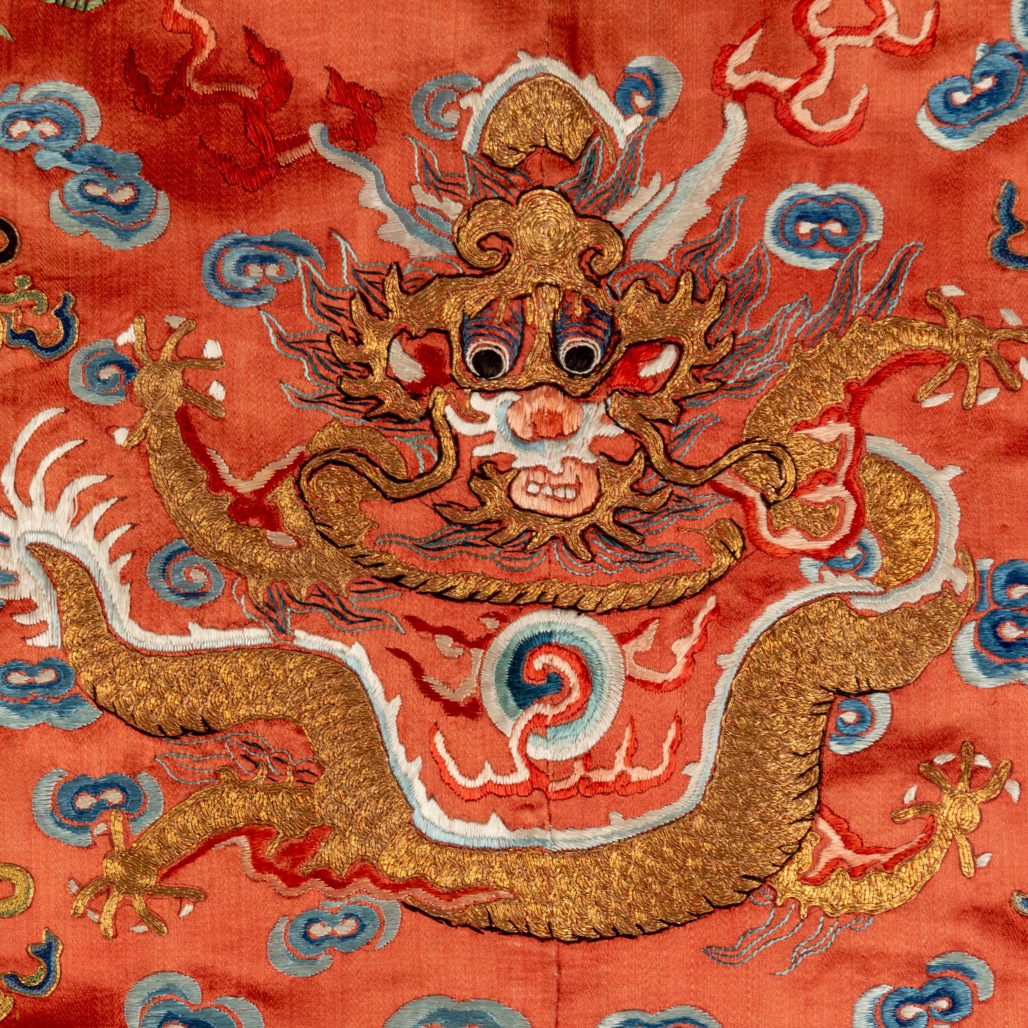 Two Chinese Red Ground Embroidered Silk Robes, 19th Century 清晚期 紅緞地袍褂兩件