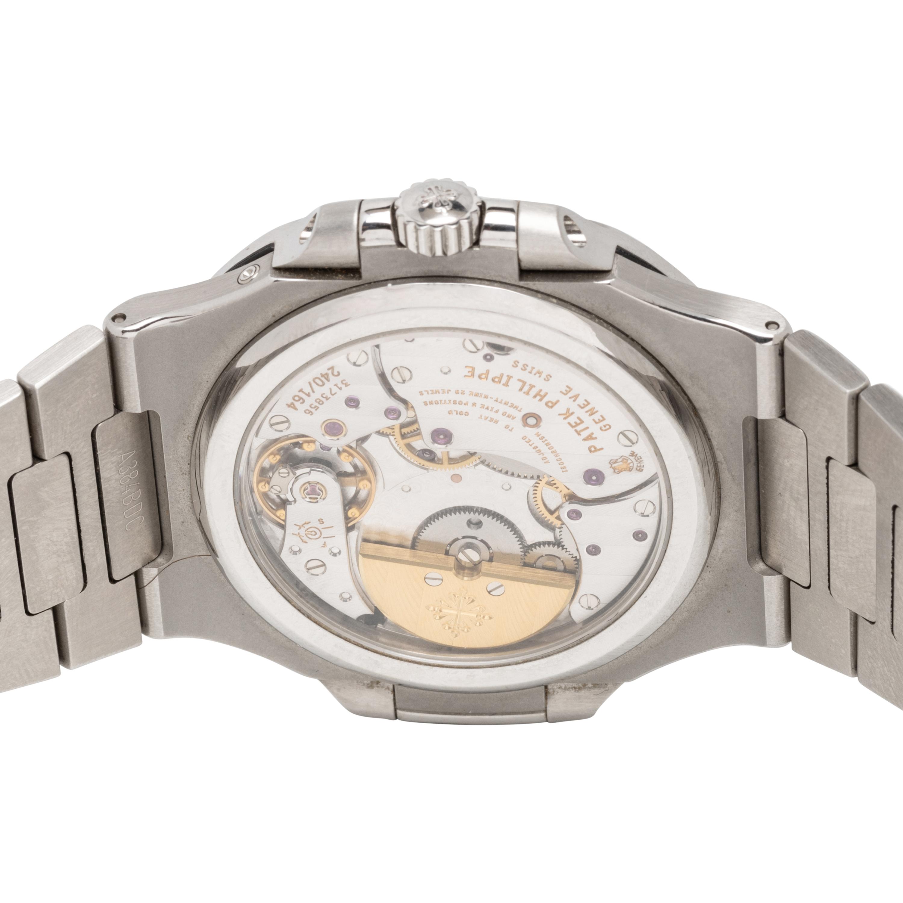 PATEK PHILIPPE, REF. 5712/1A STAINLESS STEEL 'NAUTILUS' WATCH, BOX & PAPERS