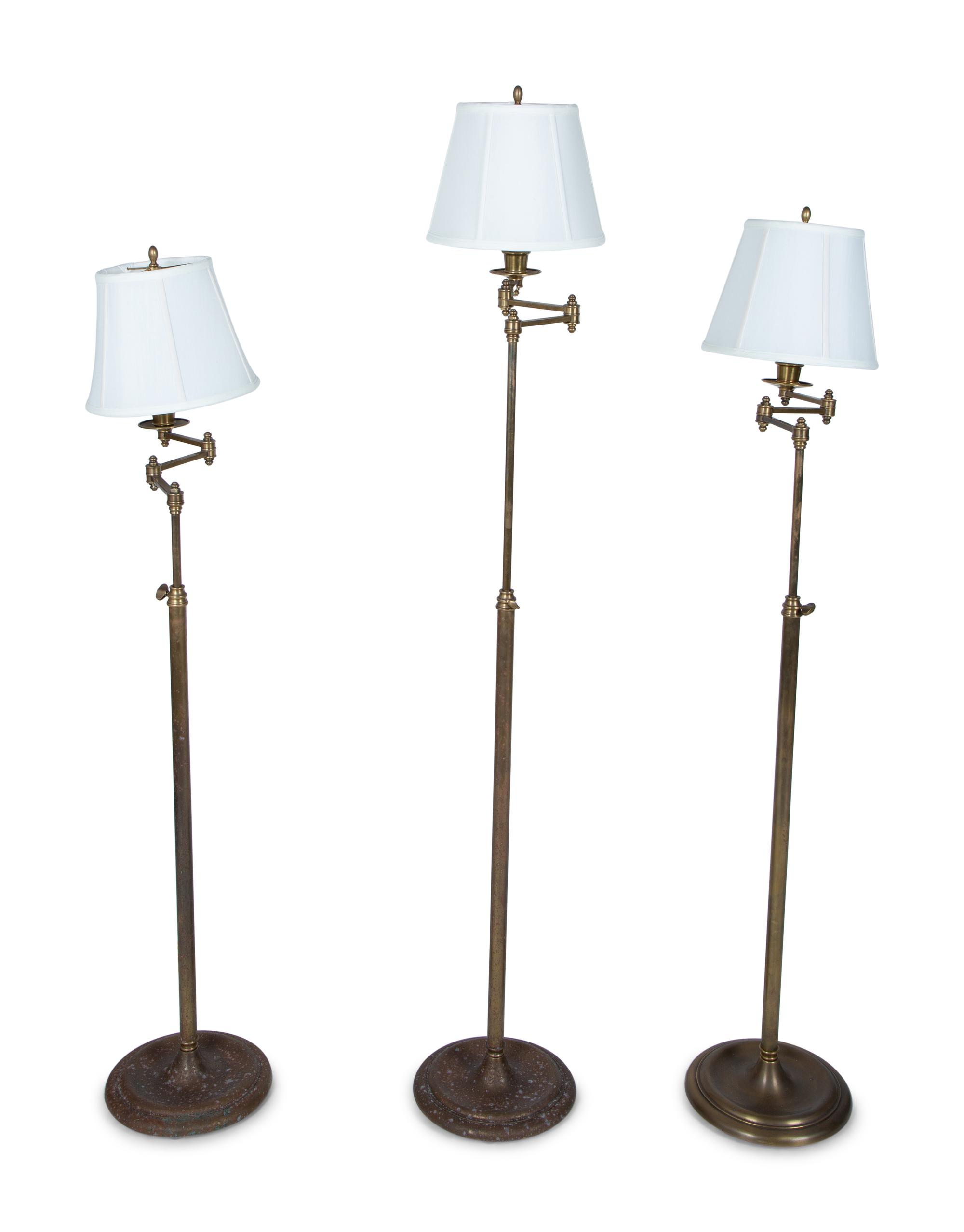 A Group of Three Brass Adjustable Floor Lamps — 20TH CENTURY