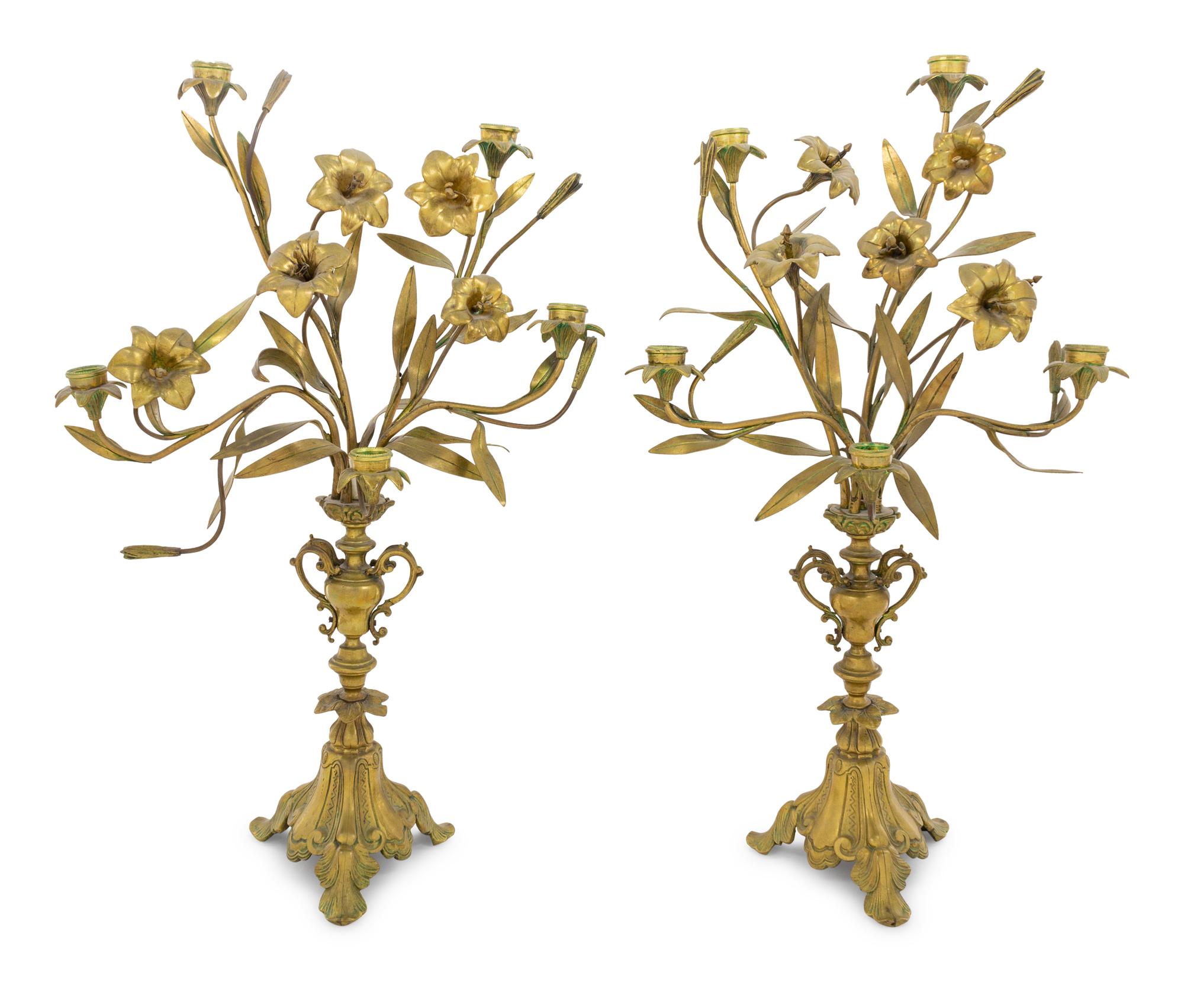 A Pair of Victorian Gilt Metal Candelabra