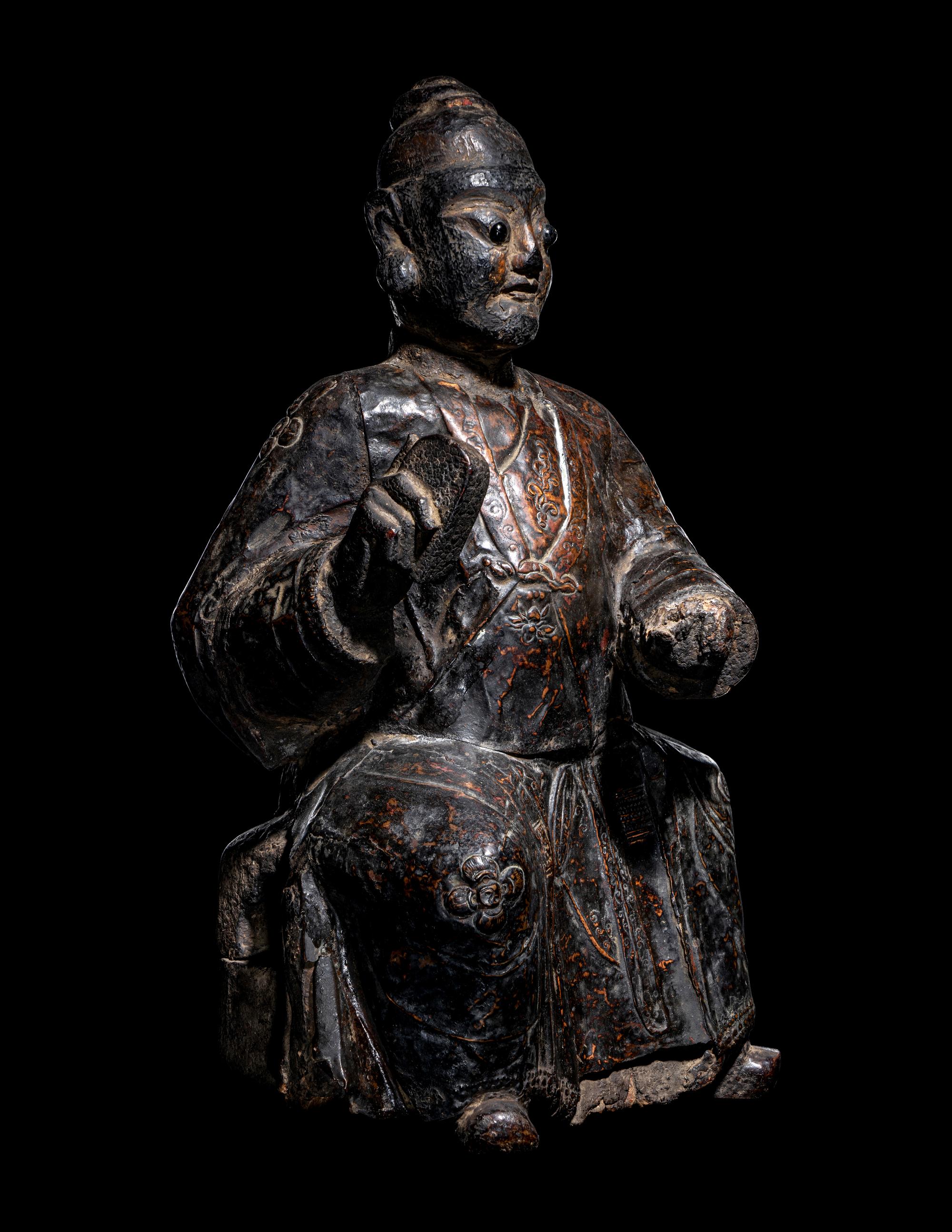 A Chinese Lacquered Wood and Copper Figure of a Daoist Immortal