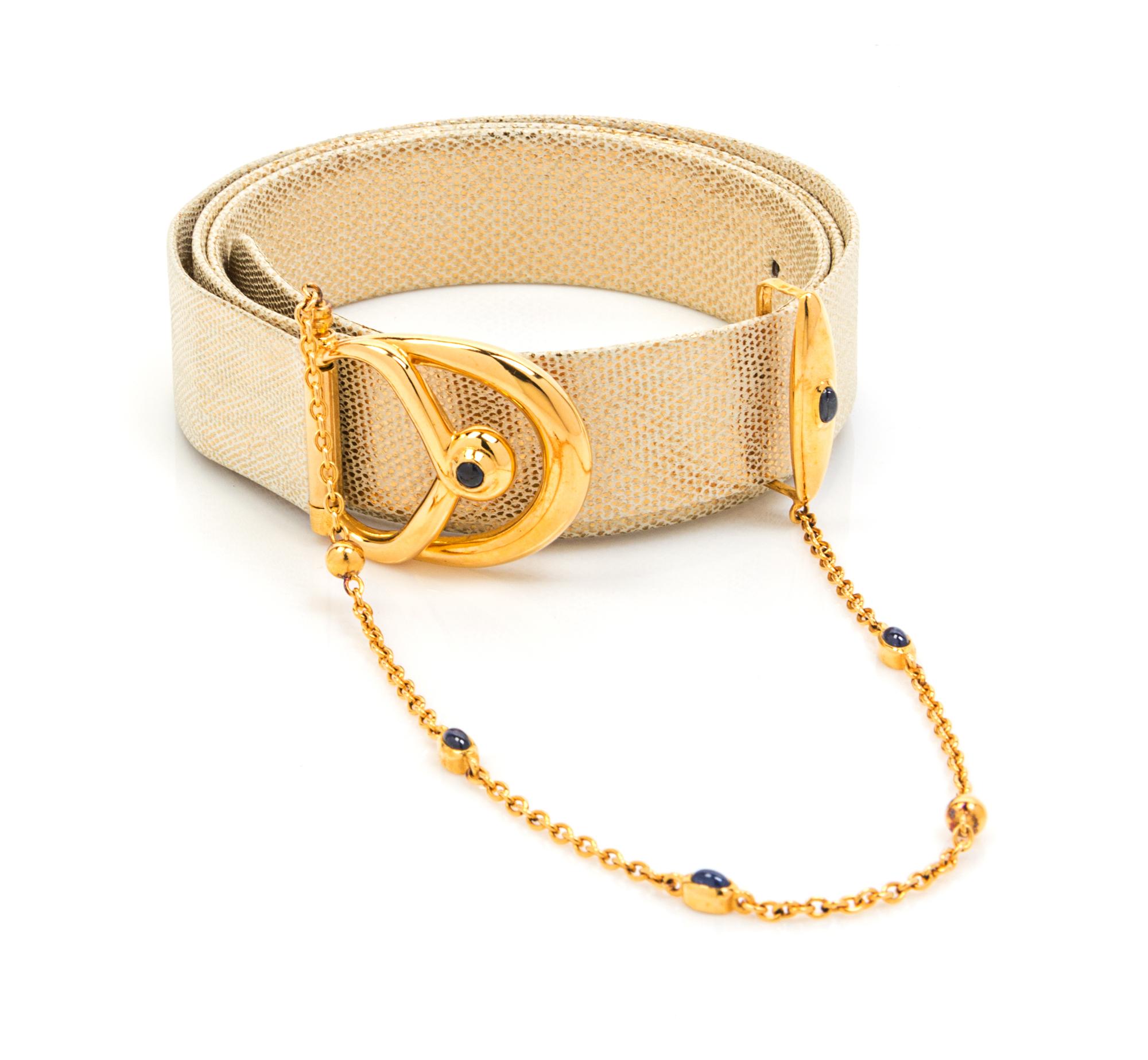 A Cartier Metallic Gold Leather Belt, Size Large.