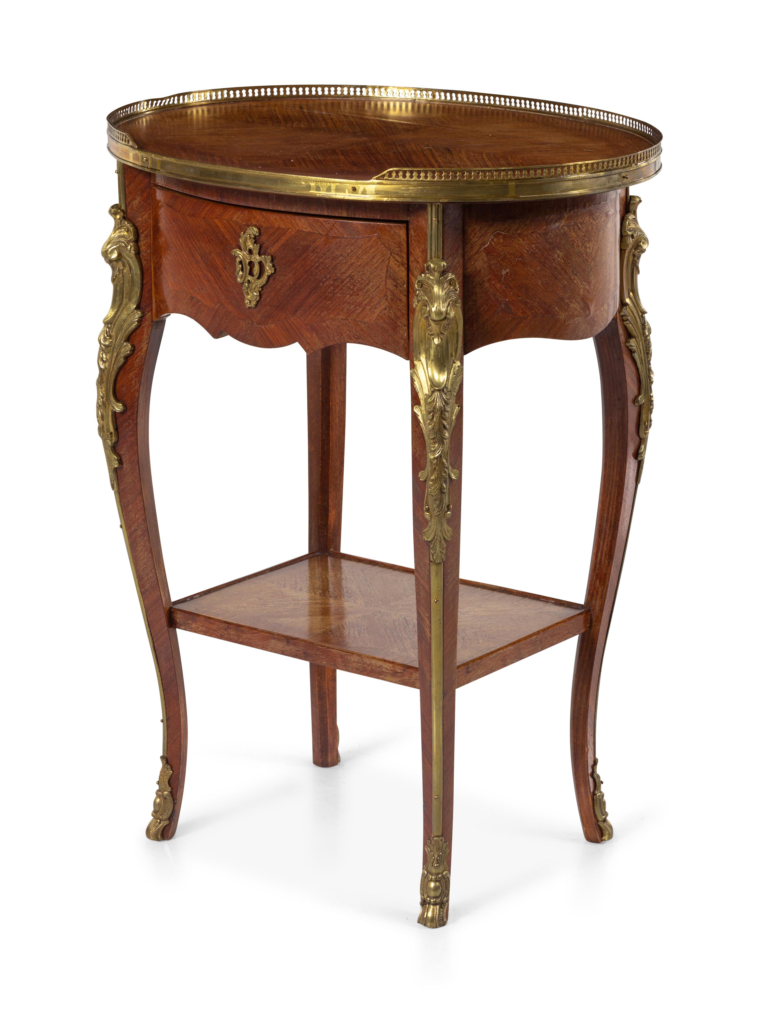 A Louis XV Style Gilt Bronze Mounted Kingwood Table
