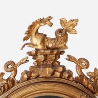 A Regency Carved Giltwood Convex Mirror Thomas Fentham & Co., circa 1810