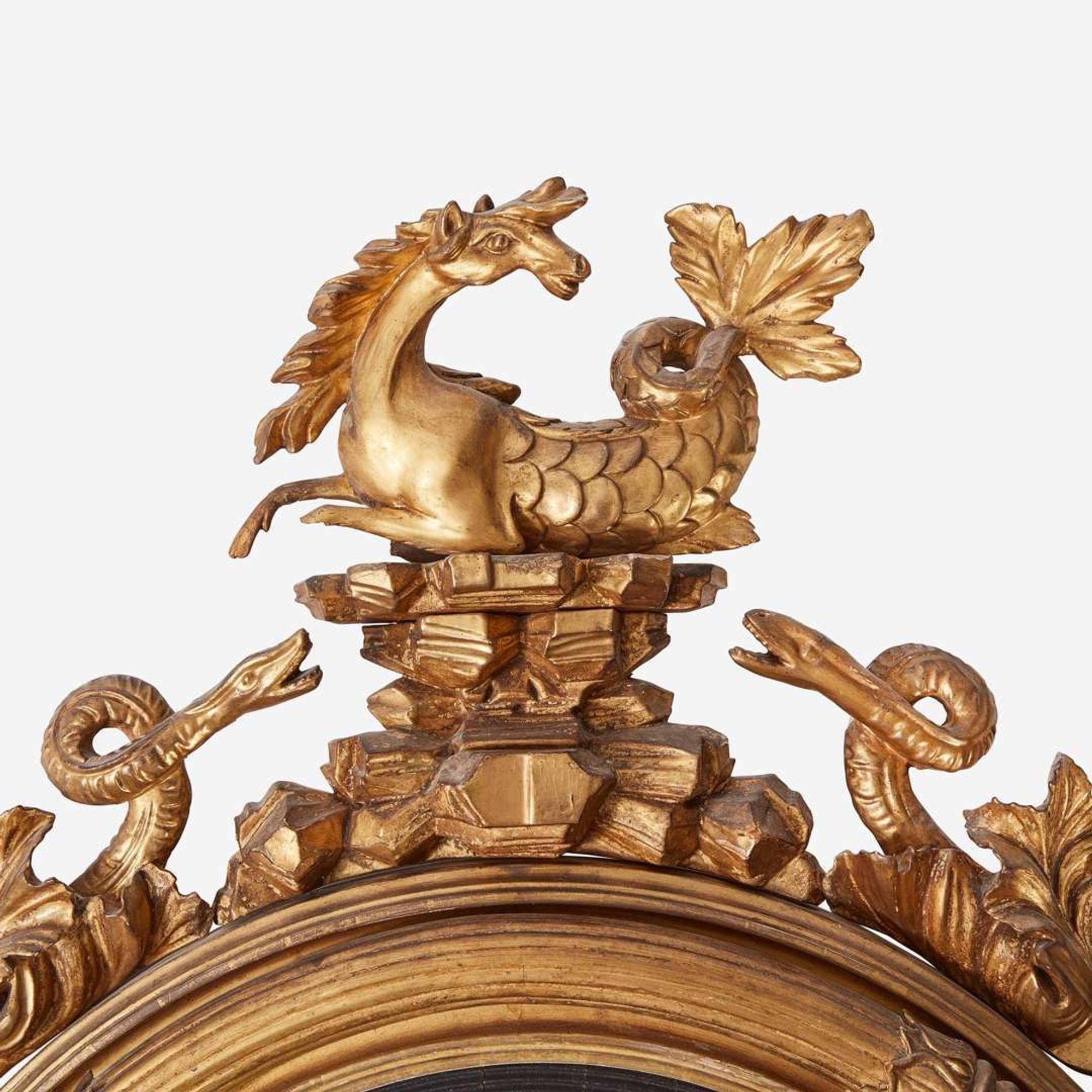 A Regency Carved Giltwood Convex Mirror Thomas Fentham & Co., circa 1810