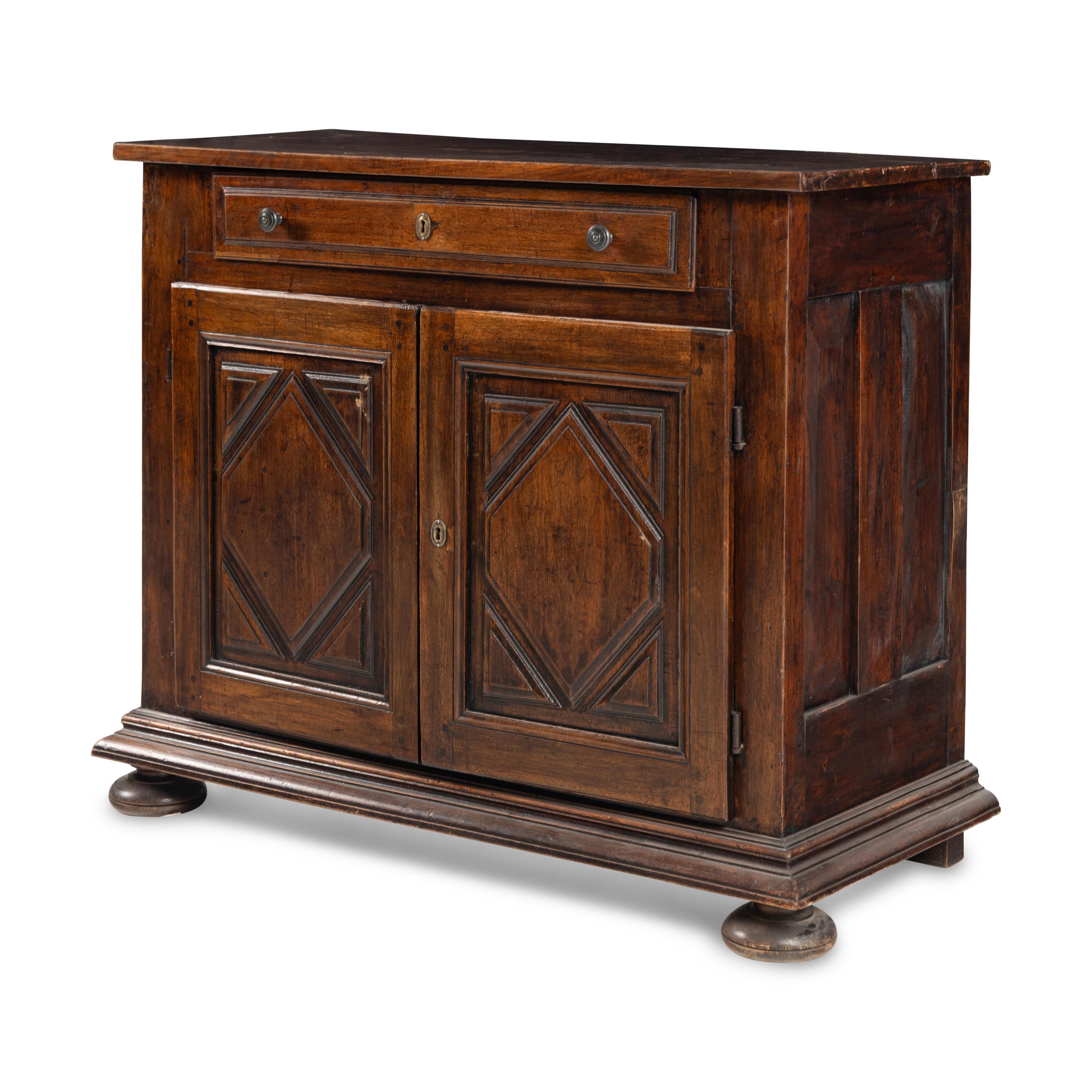 A Louis XIV Provincial Walnut Cabinet
