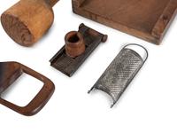 A Group of Wood and Tin Graters, Slicers and Pounders