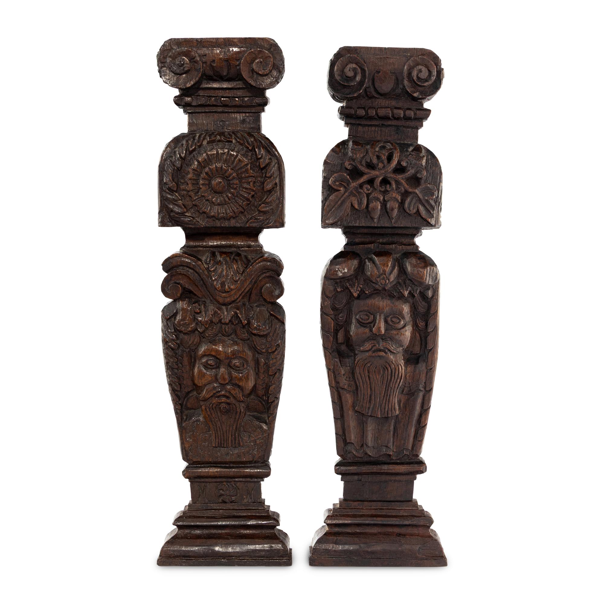 Two James I Carved Oak Balusters