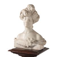 An Italian Carved Marble Bust of a Young Woman