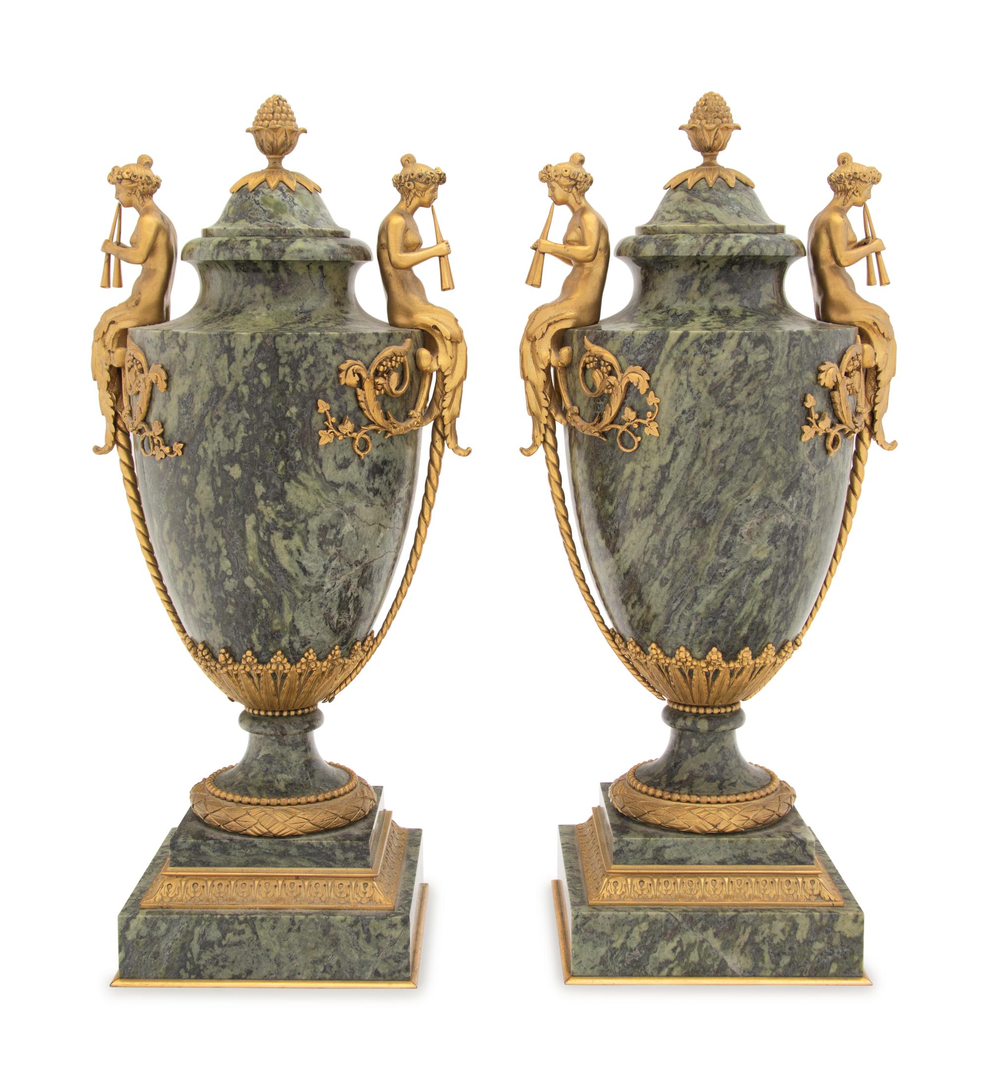 A Pair of French Gilt Bronze Mounted Marble Urns