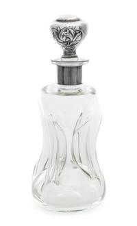 An American Silver-Mounted Liquor Bottle, Gorham Mfg. Co., Providence, RI, the stopper in the Art Nouveau taste over the pinched glass