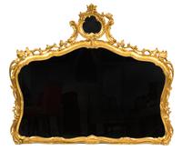 An Italian Rococo Style Giltwood Wall Mirror Height 45 x width 51 inches. — 19TH CENTURY