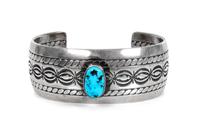 Three Southwestern Silver and Turquoise Cuff Bracelets Length of largest 5 1/2 x opening 1 1/2 inches.