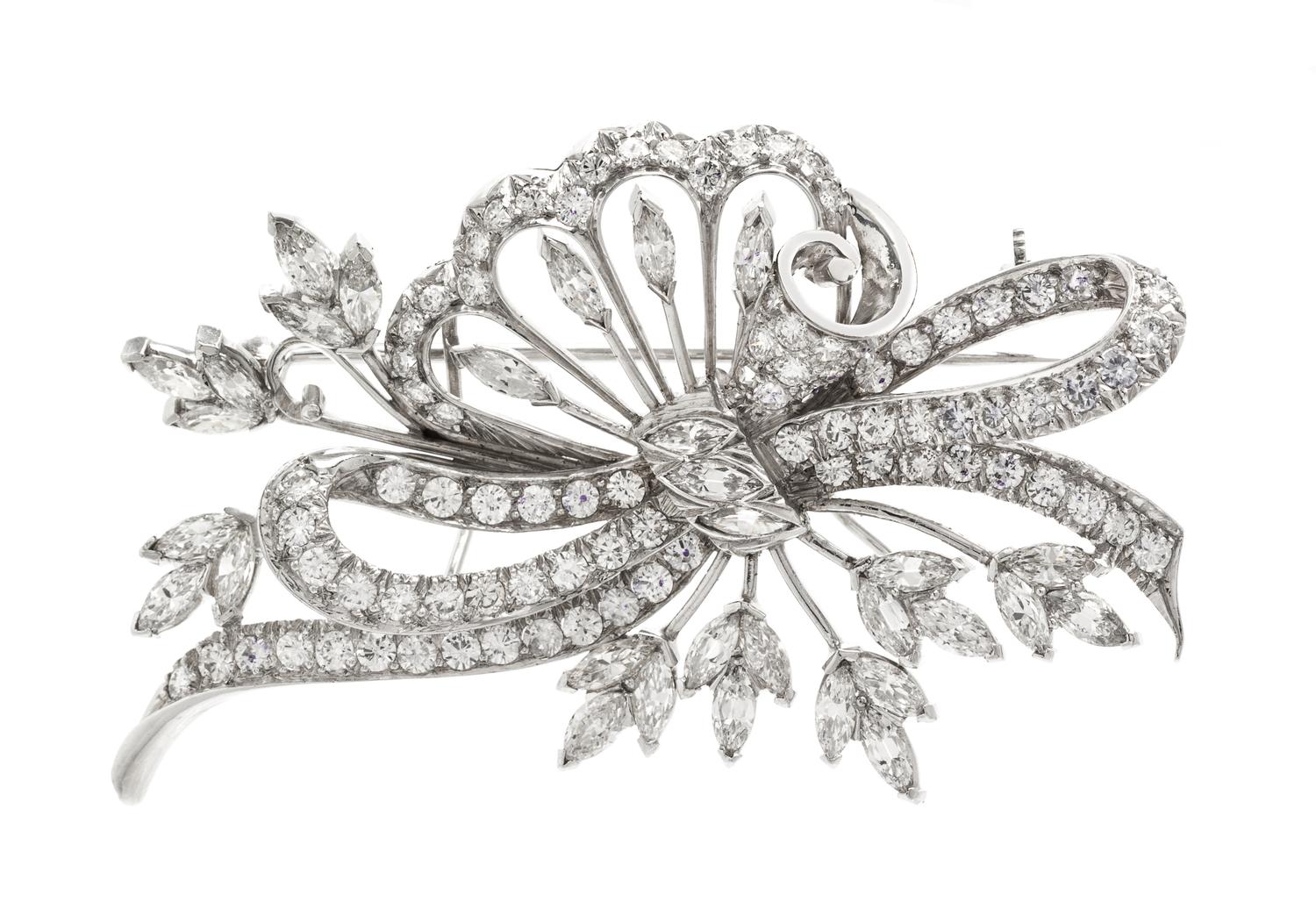 A Platinum and Diamond Spray Brooch, 15.10 dwts.