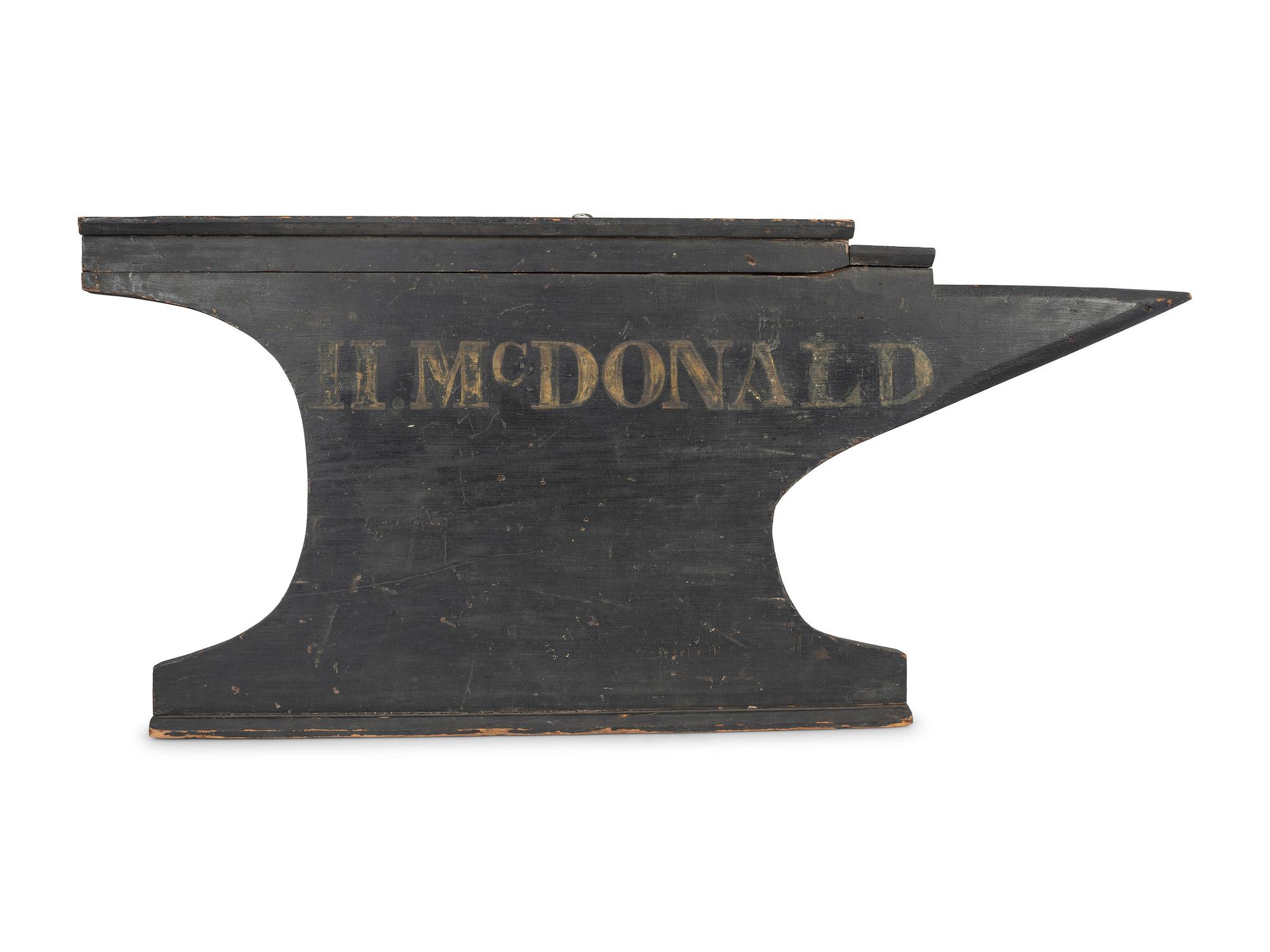A Carved and Painted Wood Anvil-Form Blacksmith Trade Sign