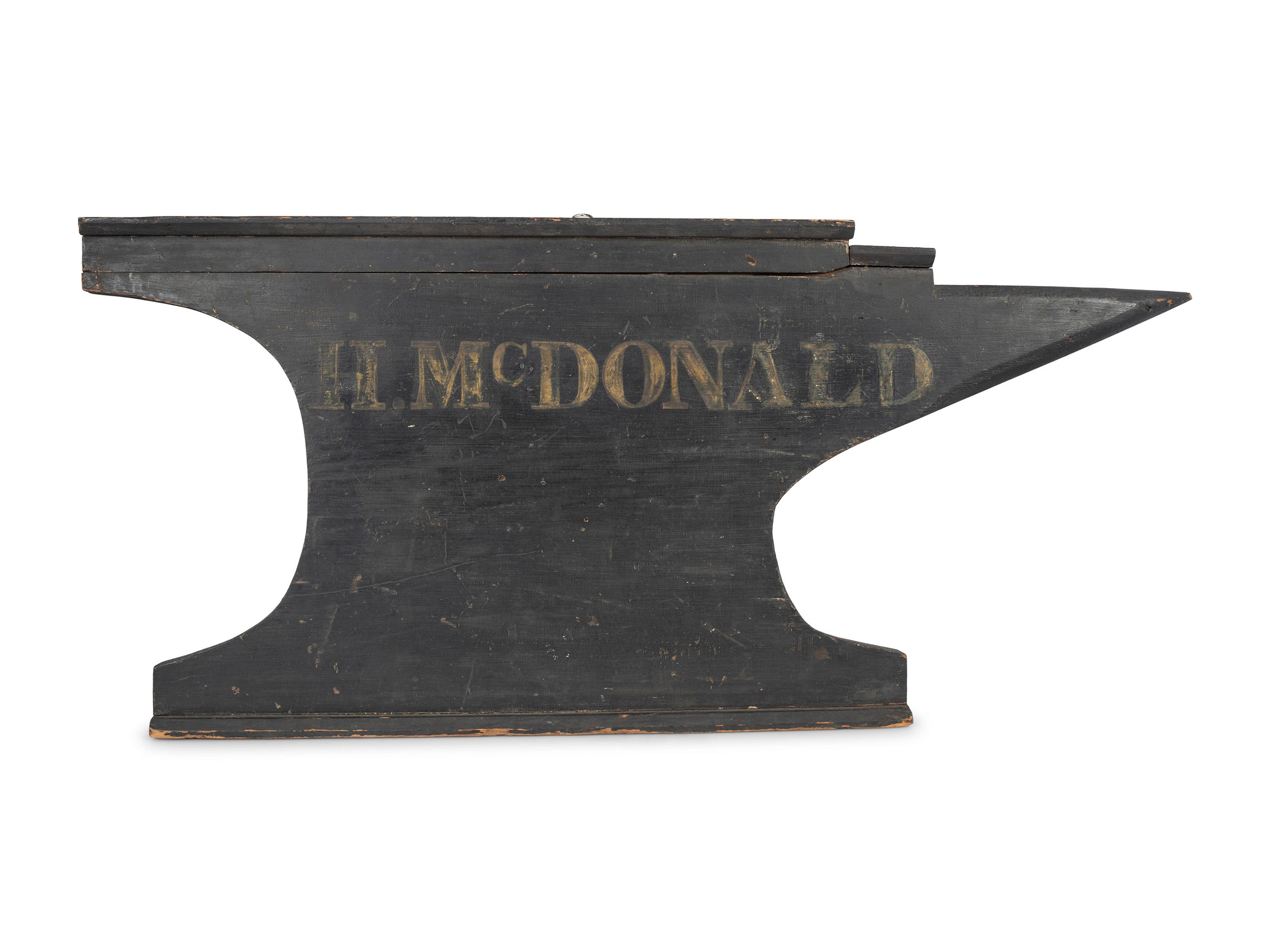 A Carved and Painted Wood Anvil-Form Blacksmith Trade Sign