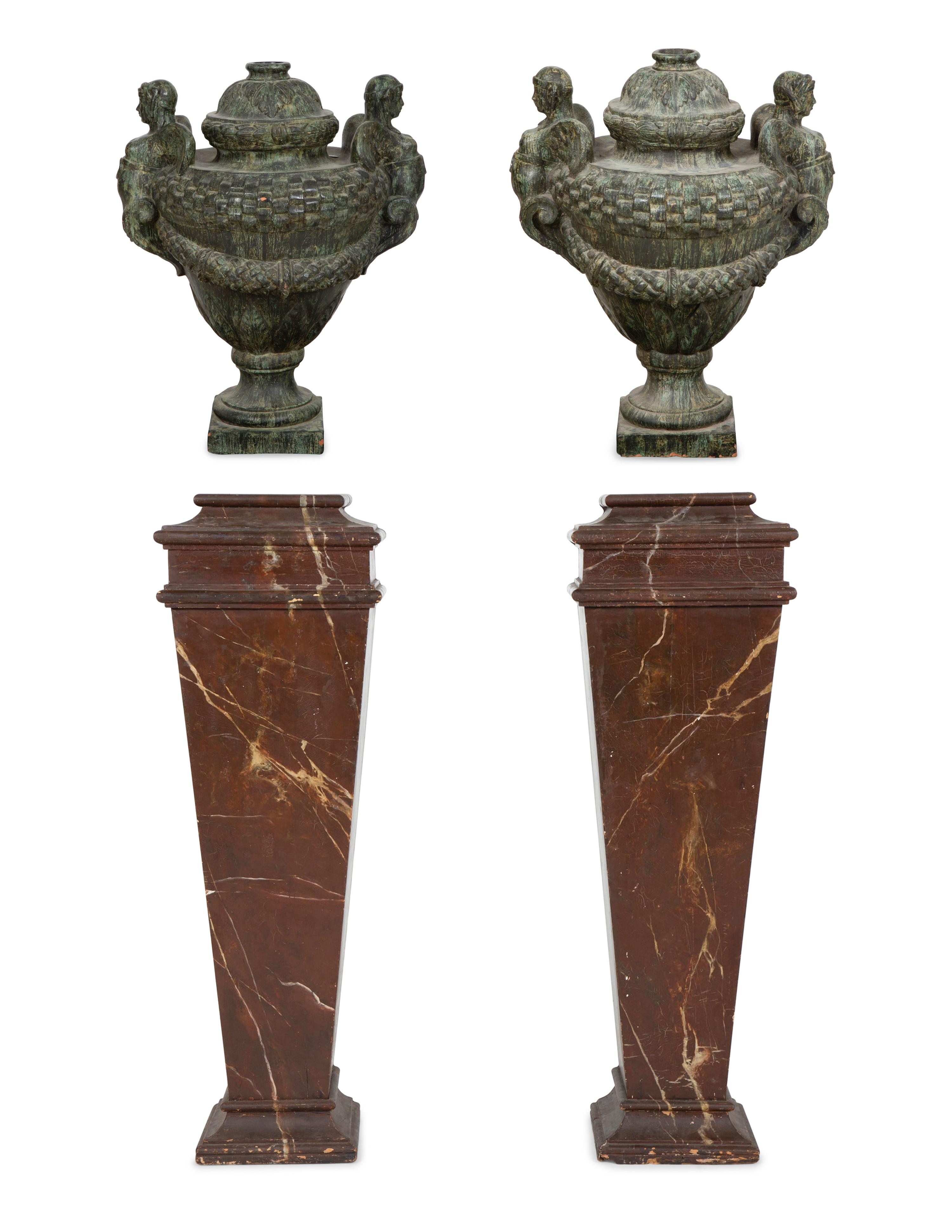 A Pair of Verdigris Patinated Terracotta Urns on Faux Marble Painted Pedestals